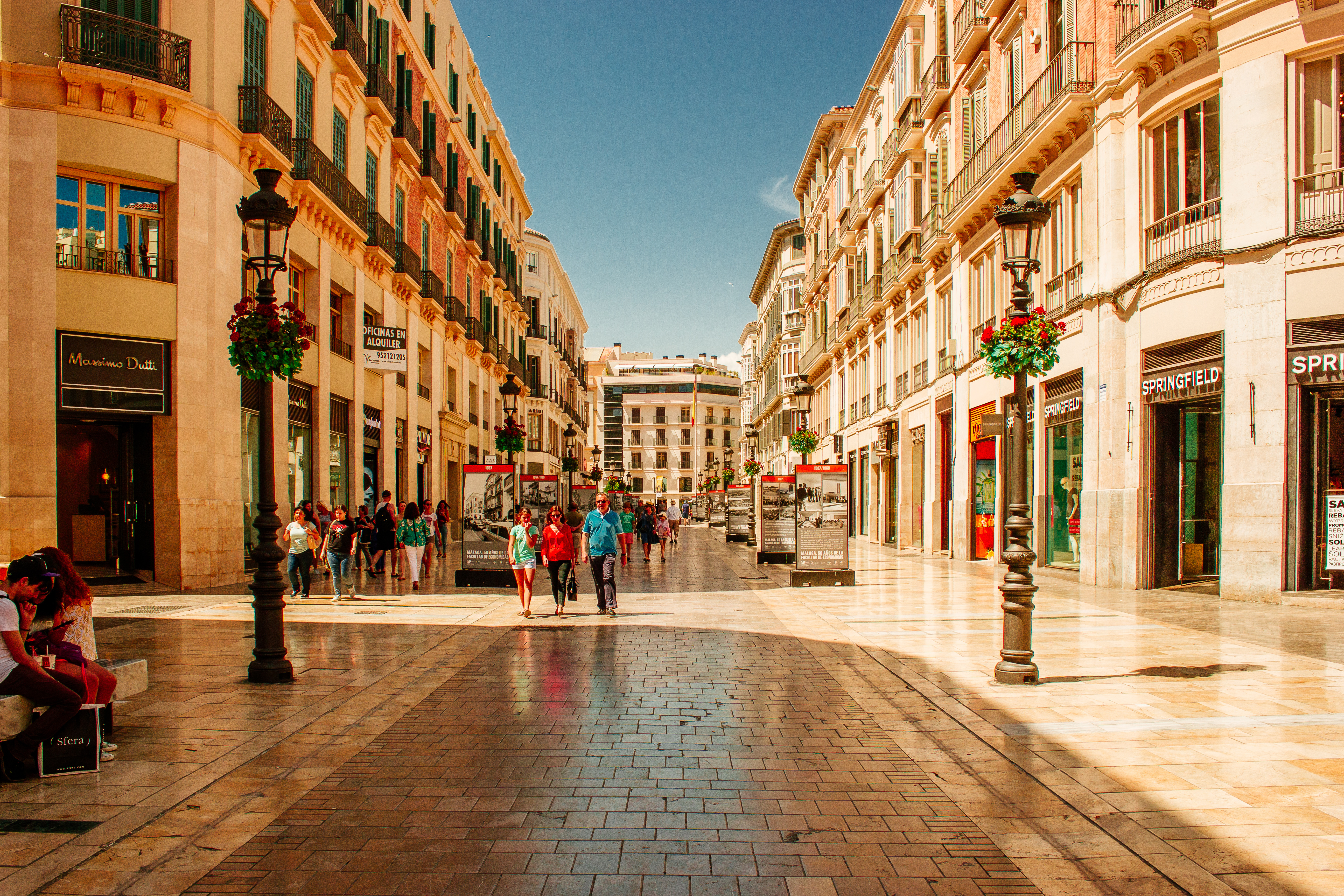 City center of Málaga, Spain, featuring bustling streets with famous stores and historic architecture