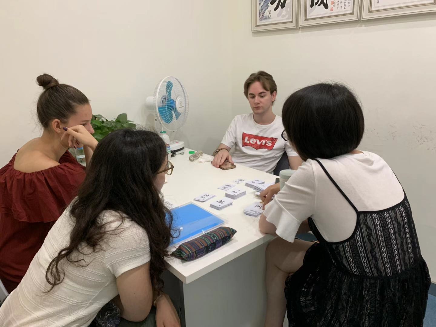 Four students in class at LTL Shanghai