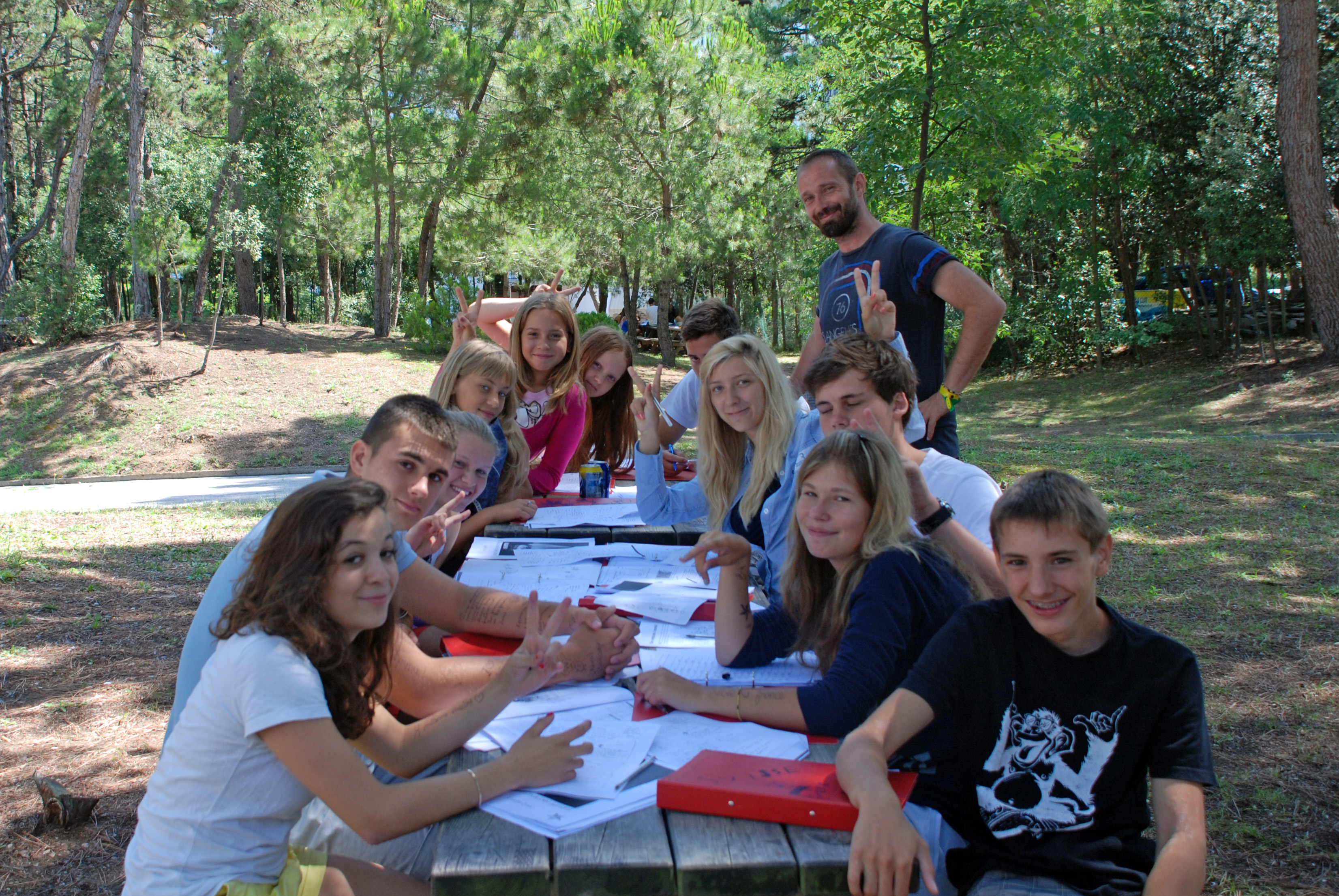 A group of students during a lesson outside at the Summer course for Juniors in Lignano