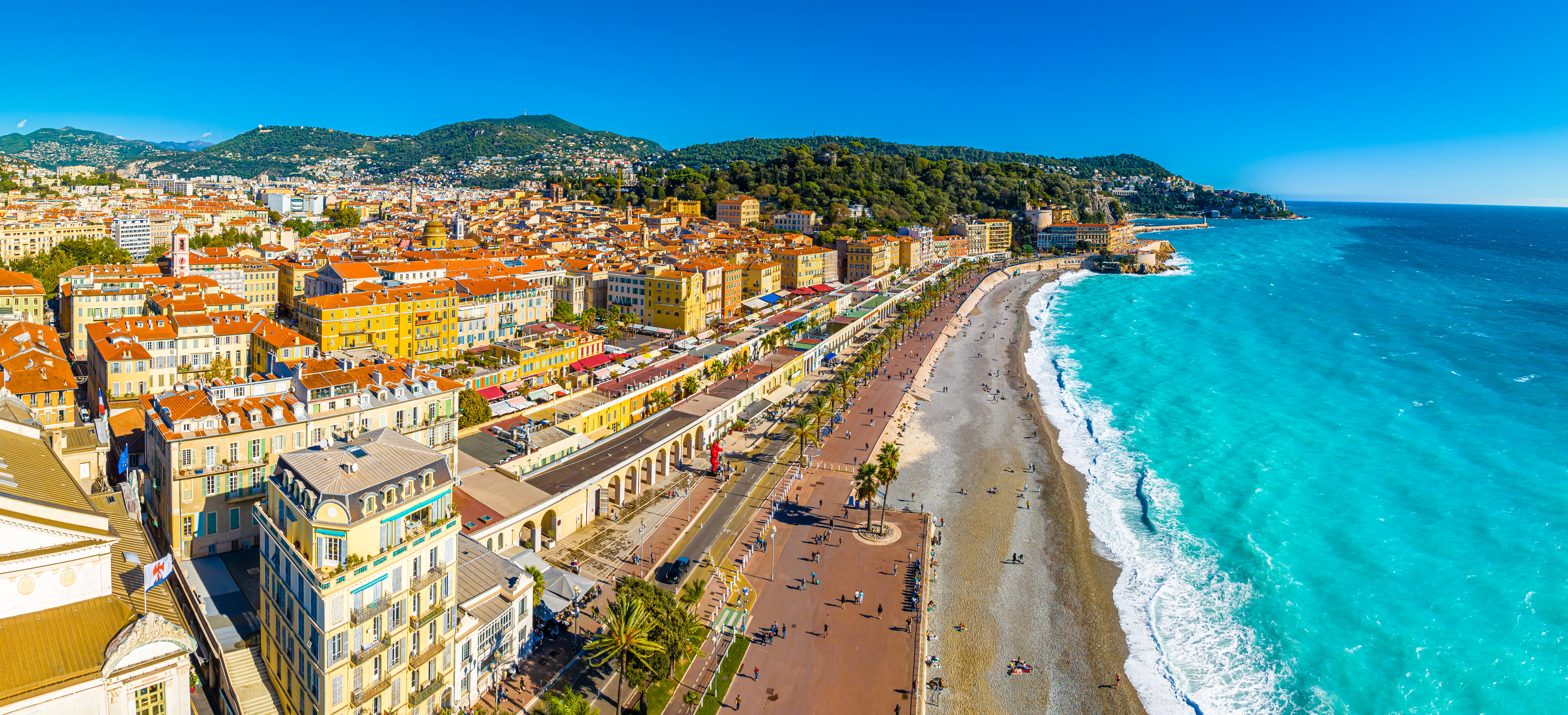 An aerial view of French Riviera, with it's  colourful Mediterranean buildings and turquoise blue ocean