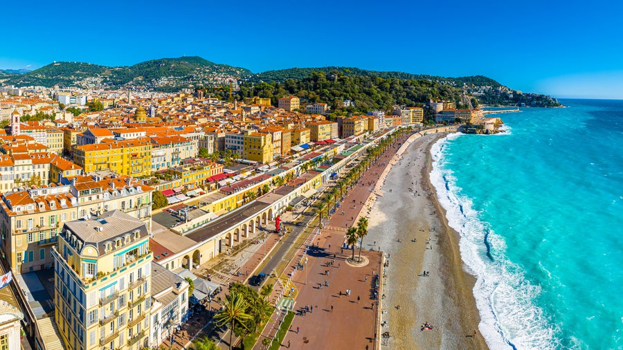 An aerial view of French Riviera, with it's  colourful Mediterranean buildings and turquoise blue ocean