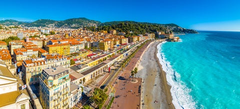 An aerial view of French Riviera, with it's  colourful Mediterranean buildings and turquoise blue ocean