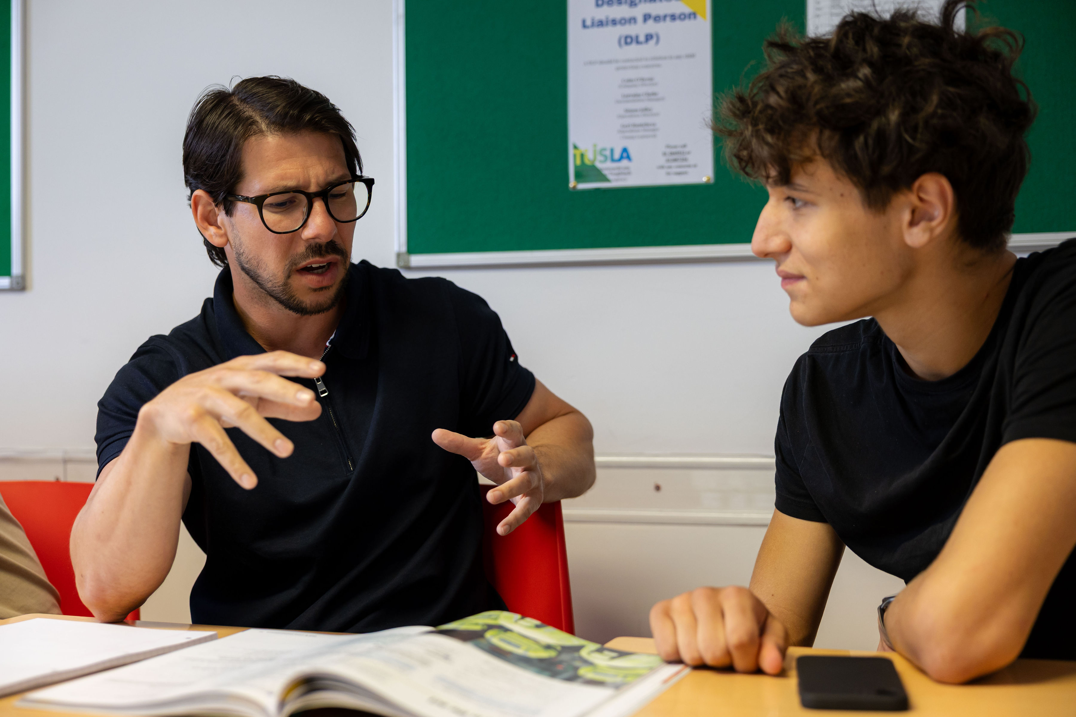 Students in class having a conversation