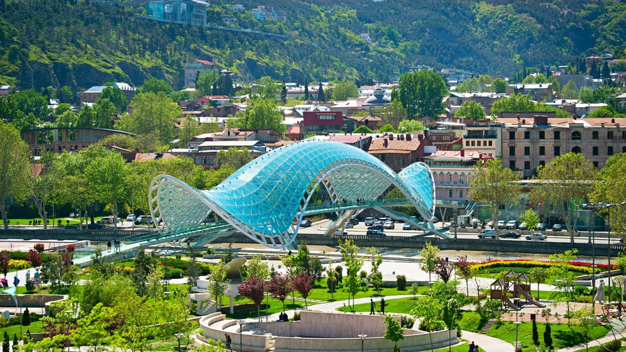 Bridge of Peace spanning the Mtkvari River connecting Tbilisi’s historic old town with the newer parts of the city in Tbilisi, Georgia