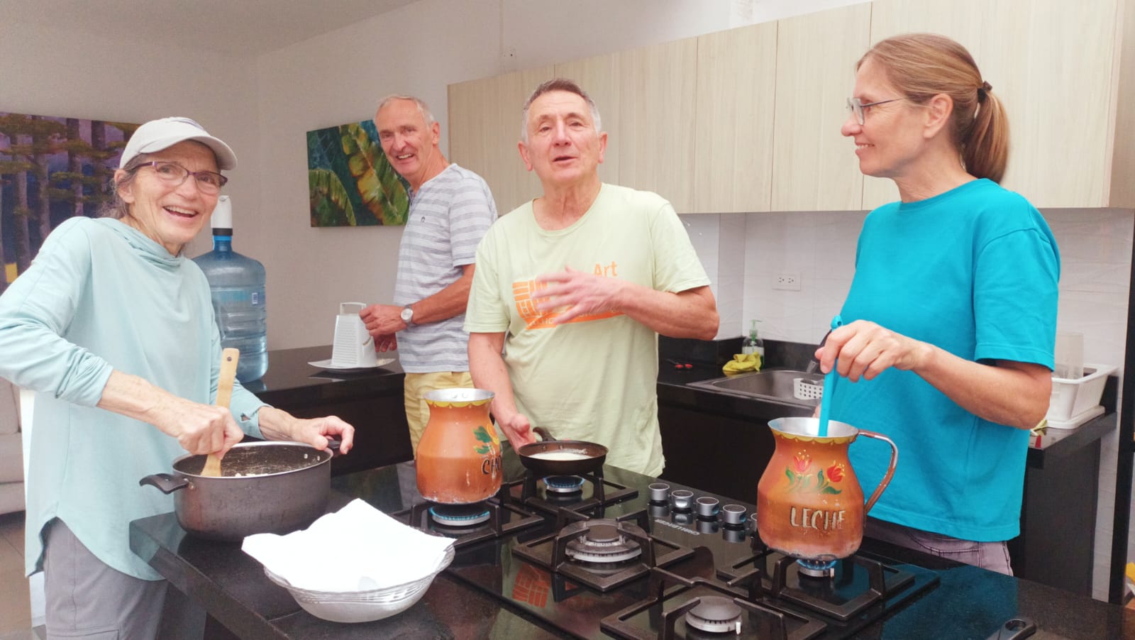 Four students cooking together