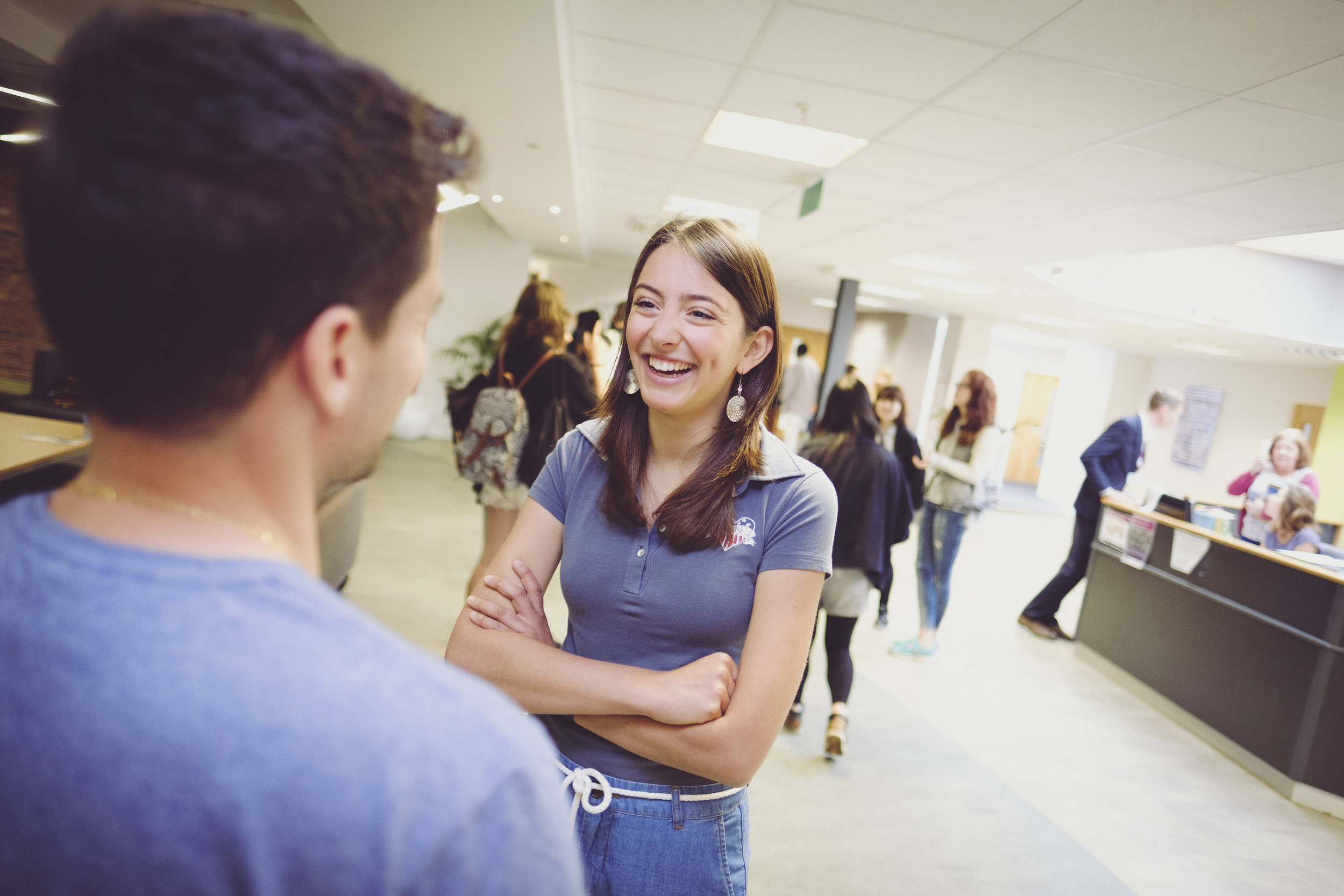 Two students talking at school