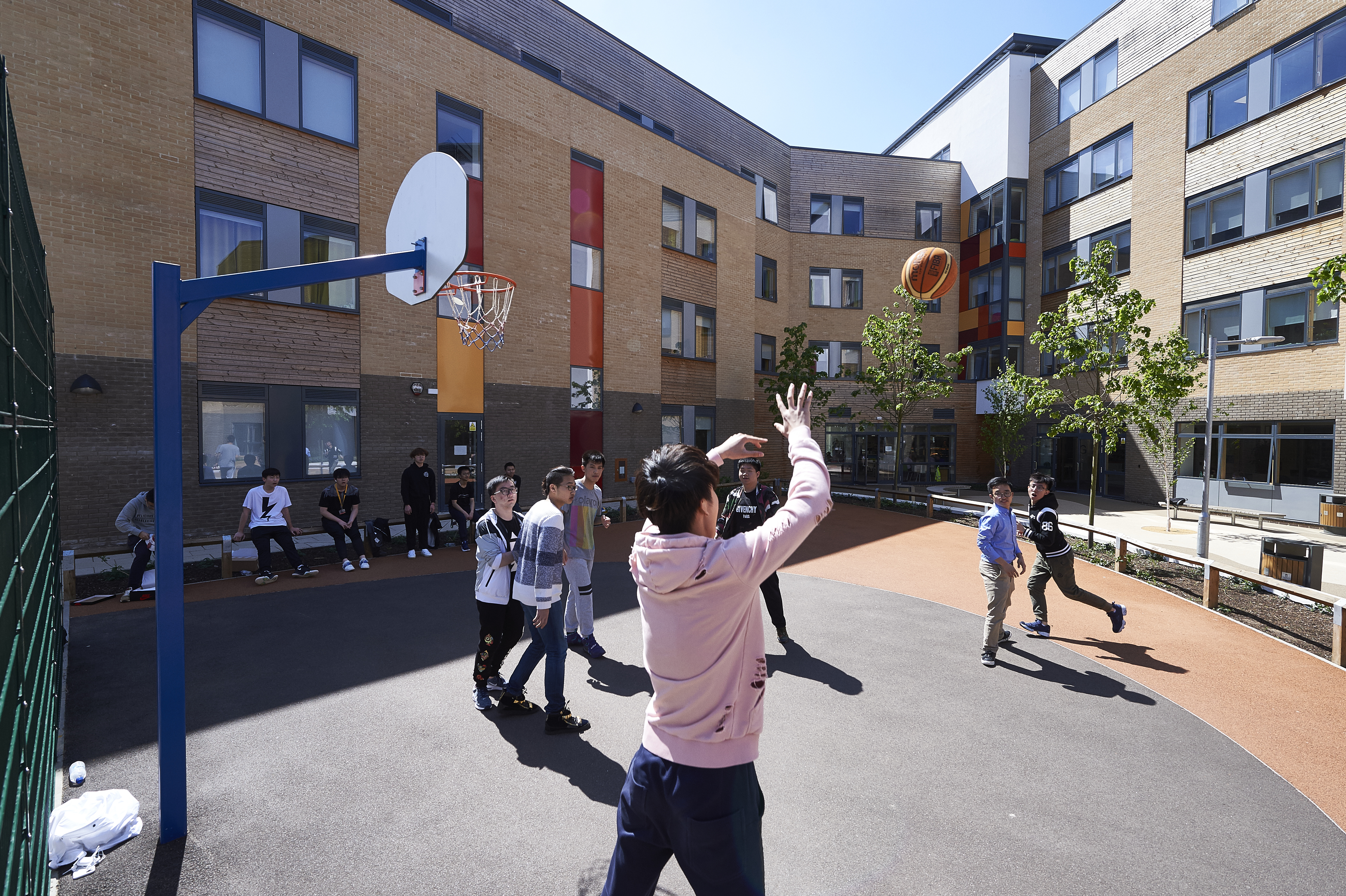 Students playing basketball