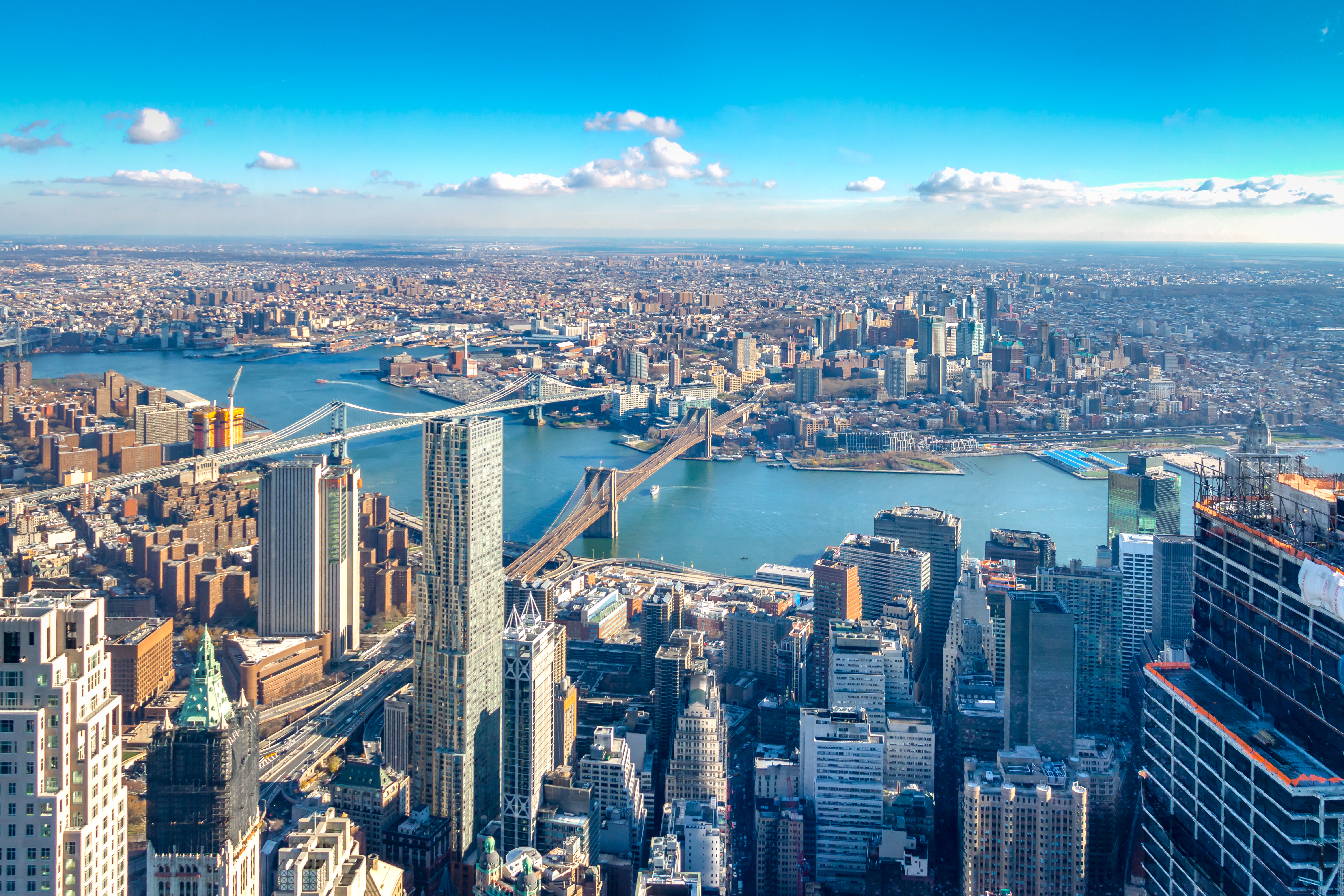 Aerial view of New York city, Manhattan and its modern skyscrapers, Hudson River and Brooklyn Bridge