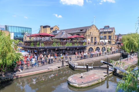 Camden neighborhood in London featuring a lively bar alongside a canal