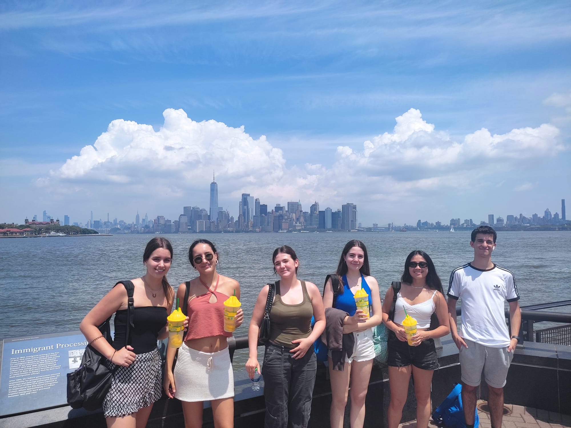 A group of students on the ferry to the Statue of Liberty