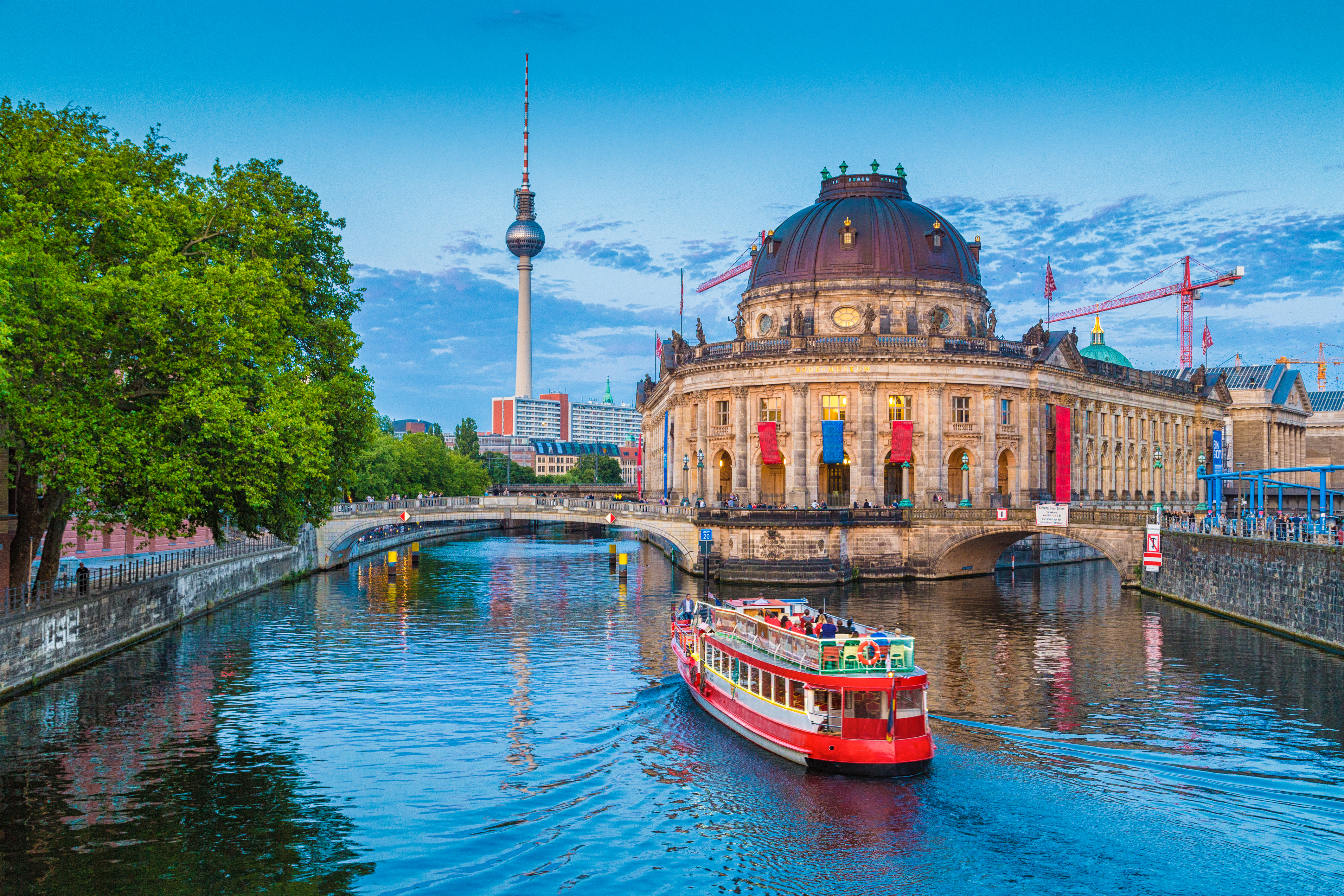 Berlin Cathedral (Berliner Dom) surrounded by lush gardens and situated near the Spree River in Germany