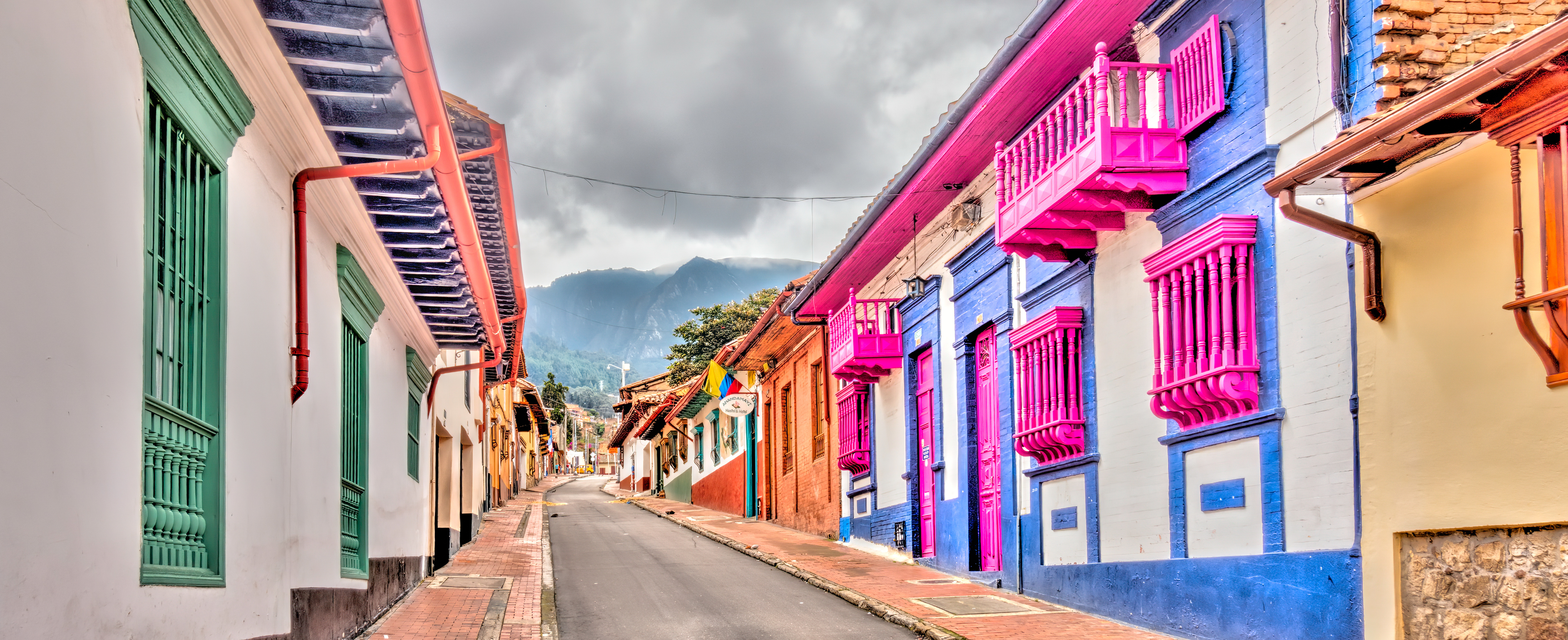 Bogotá’s La Candelaria district highlights its colorful colonial buildings, cobblestone streets, and vibrant murals, Colombia