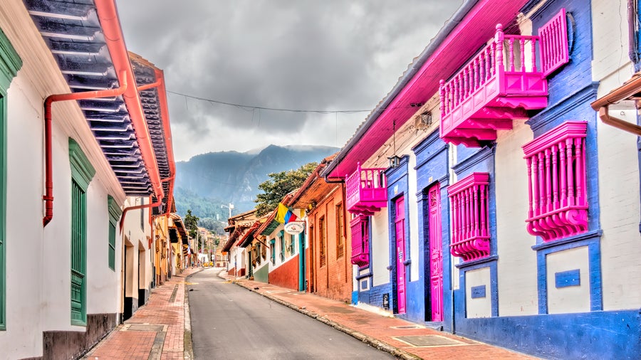 Bogotá’s La Candelaria district highlights its colorful colonial buildings, cobblestone streets, and vibrant murals, Colombia