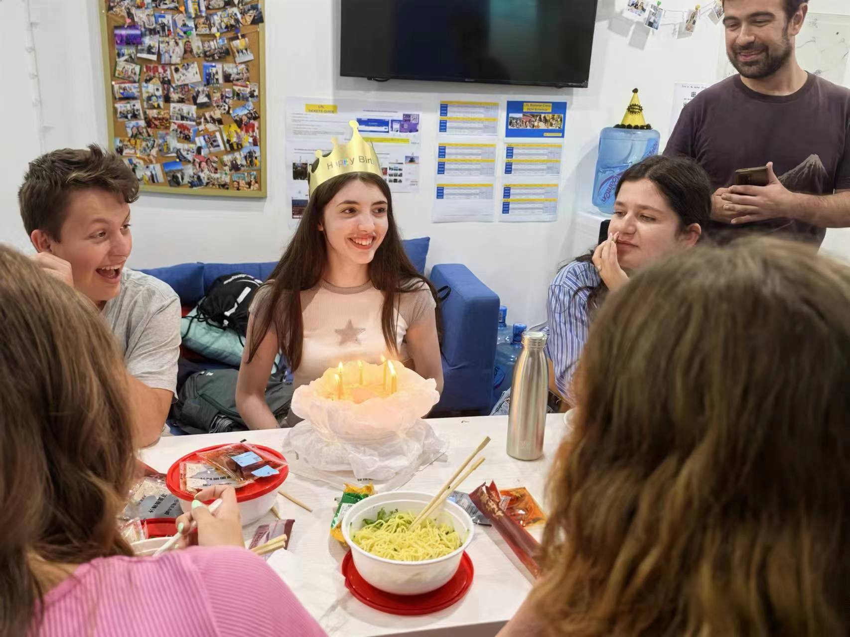 Students in school celebrating a birthday