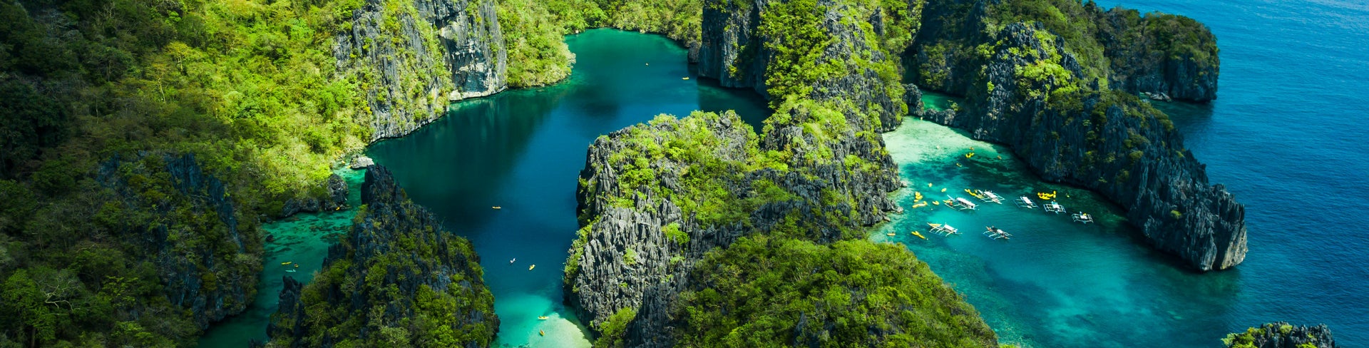 Aerial view of El Nido, Palawan, Philippines, featuring Big Lagoon, Small Lagoon, and towering limestone cliffs