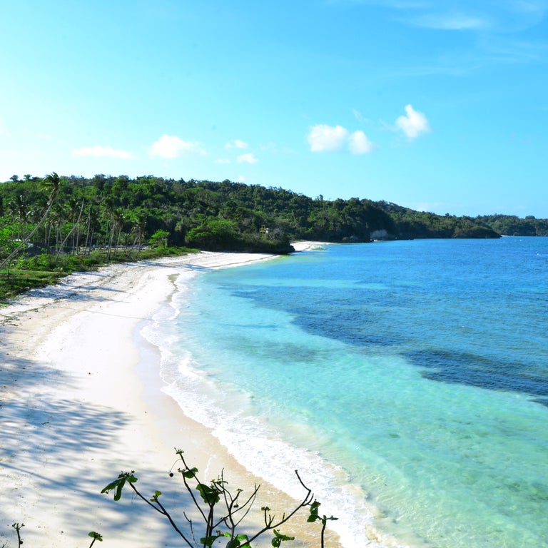Ilig Iligan Beach on Boracay Island, Philippines, with white sand and clear turquoise waters