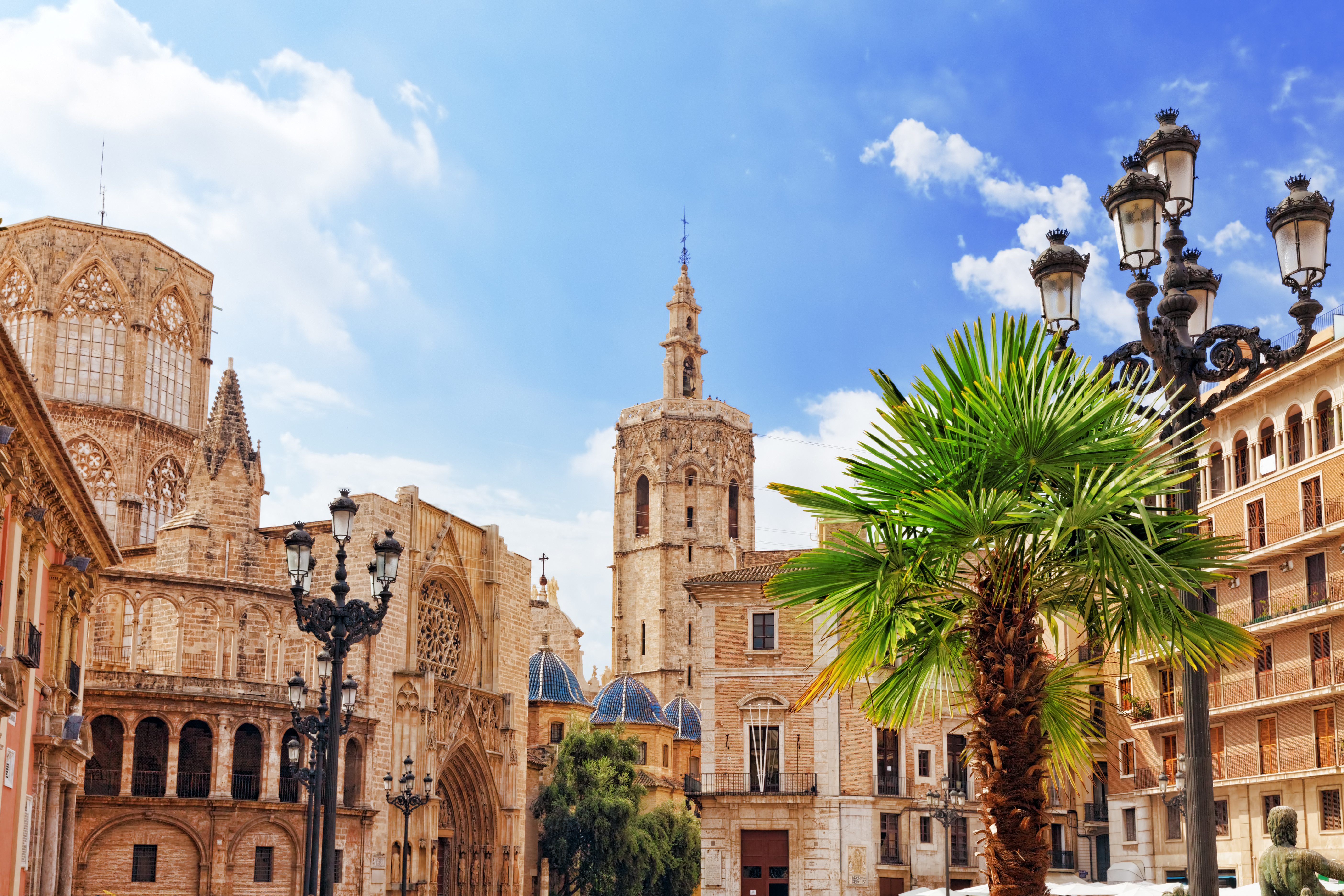 Plaza de la Virgen in Valencia, Spain, featuring the Basilica of the Virgin of the Forsaken, Valencia Cathedral, and the Palau de la Generalitat Valenciana