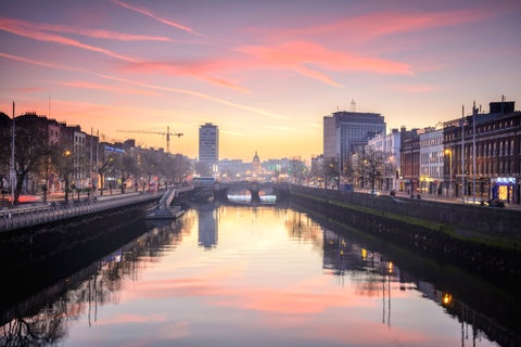 Peaceful scene at the Dublin riverbank, Ireland, with calm water and quiet surroundings