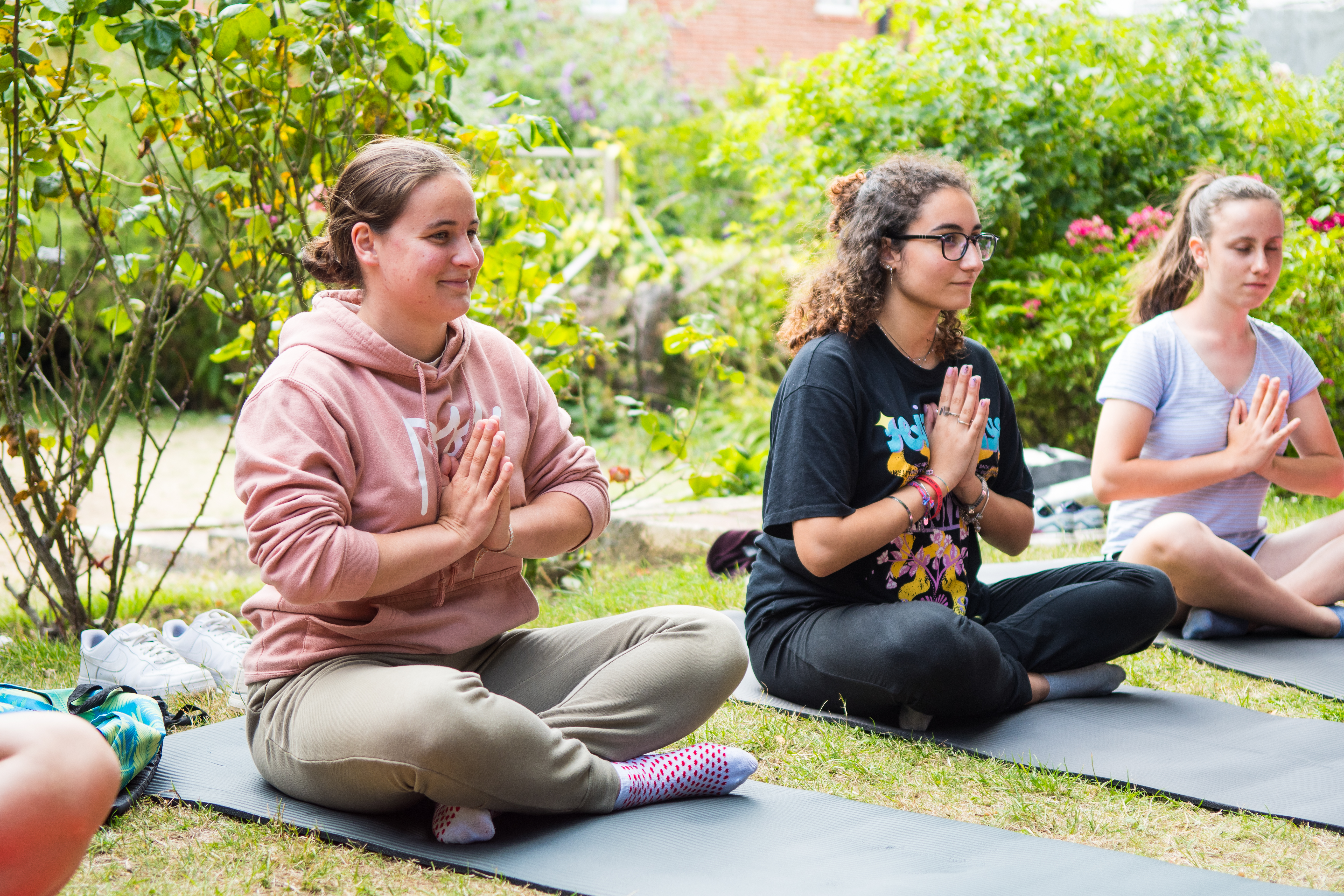 A group of students doing yoga