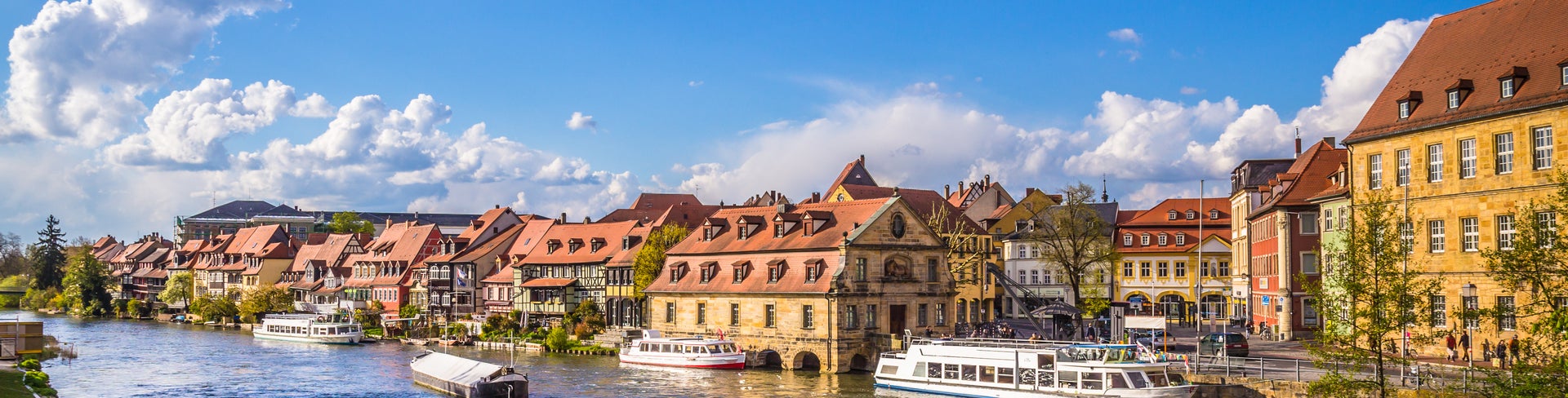 Boats in Regnitz River at Bamberg Historic City Center, Germany