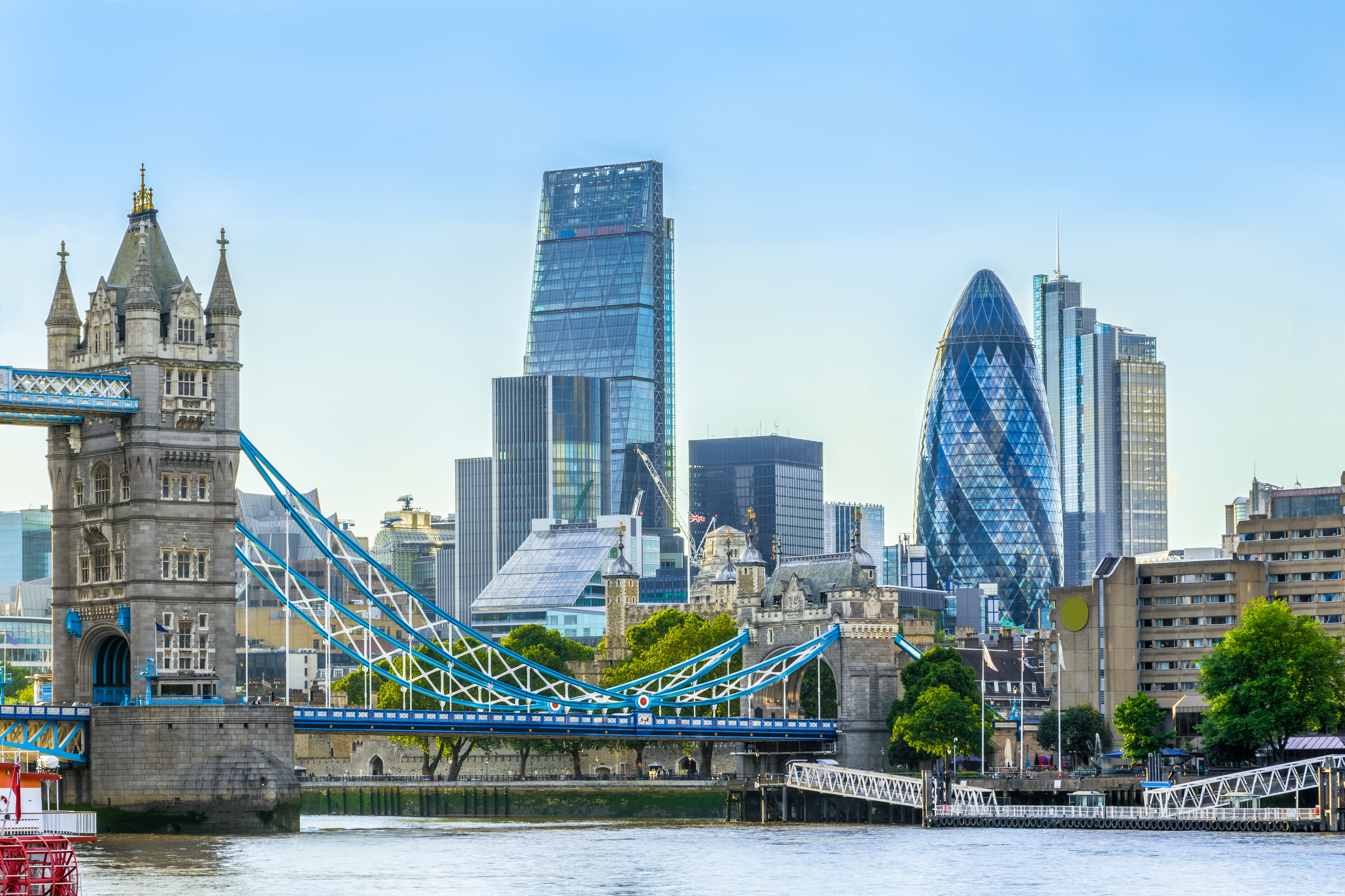London skyline from the River Thames with Tower Bridge on a sunny day, UK