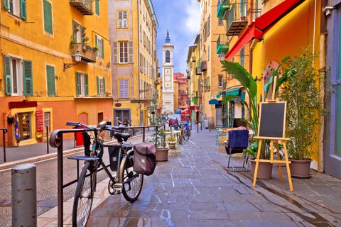 Nice colorful street architecture and church view in Nice, France