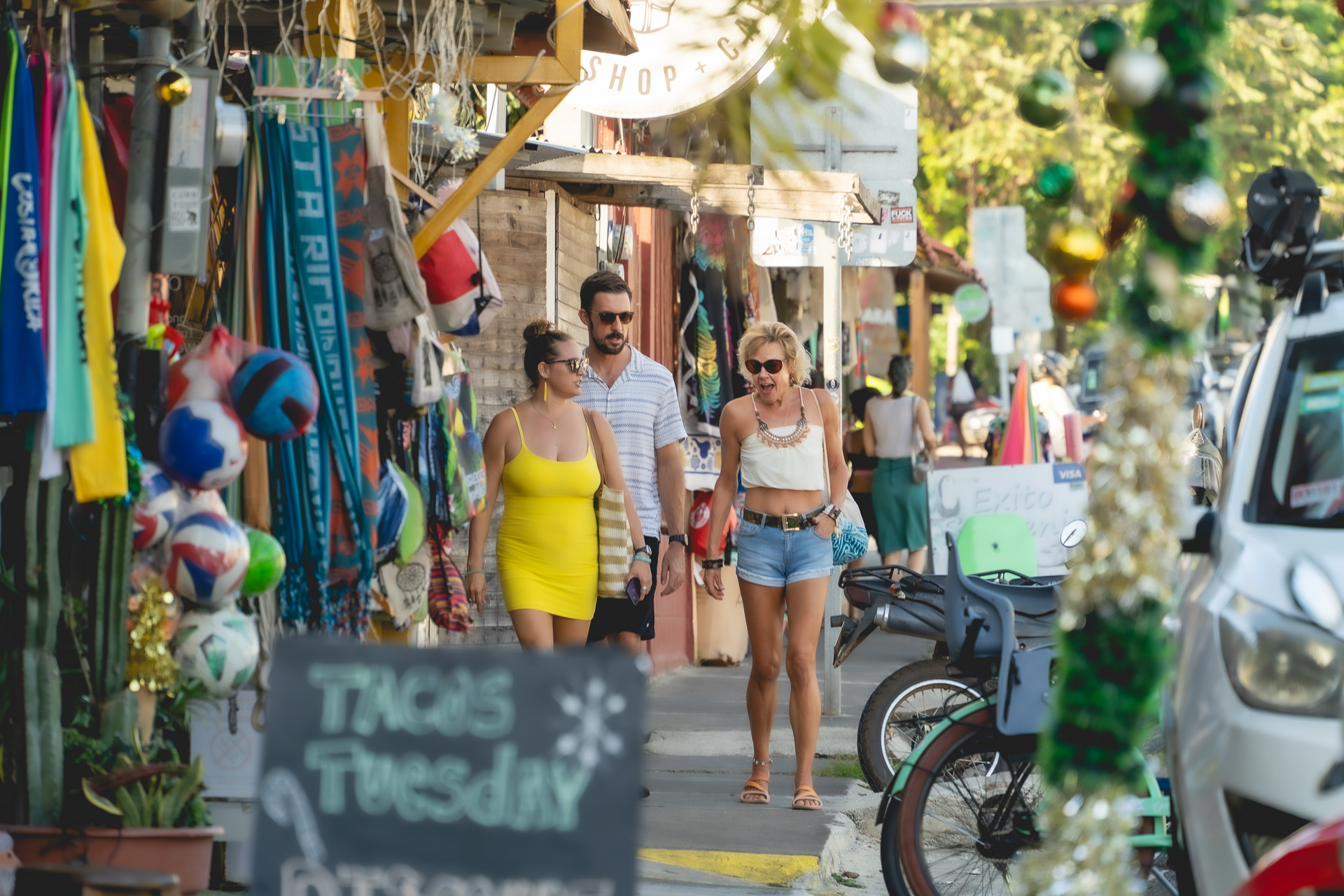Three students walking around Guanacaste