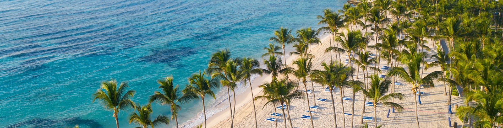 Aerial view of beautiful white sandy beach in Punta Cana, Dominican Republic