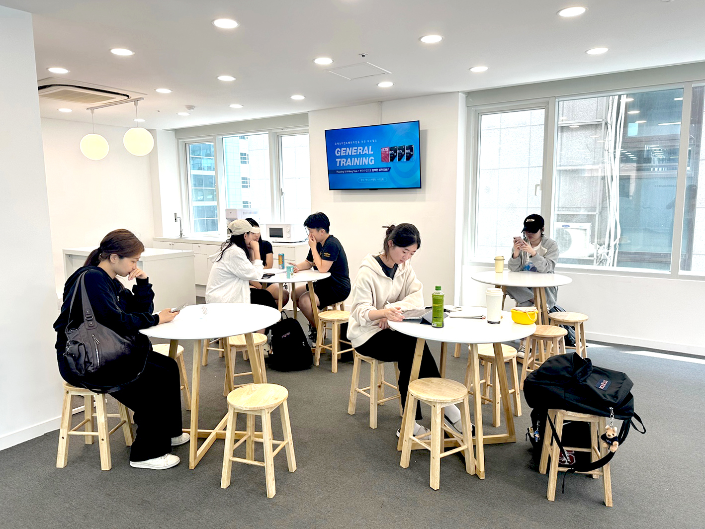 Some students relaxing at the lounge at Lexis Seoul Gangnam