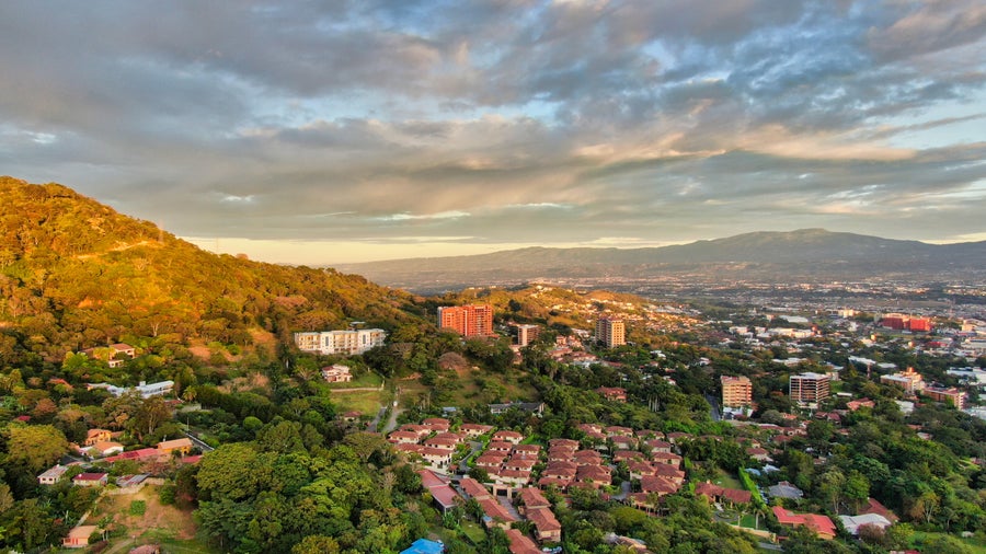 Aerial of San Rafael de Escazu, Costa Rica with the traditional Church and farmers market