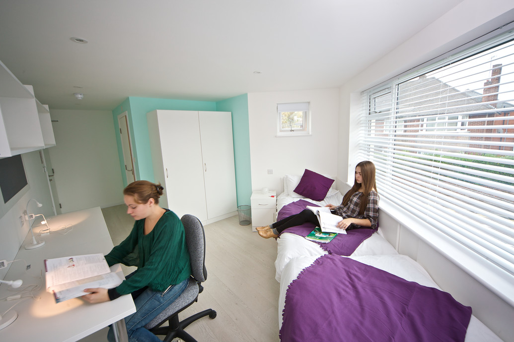 Two students in a double bedroom at the residence