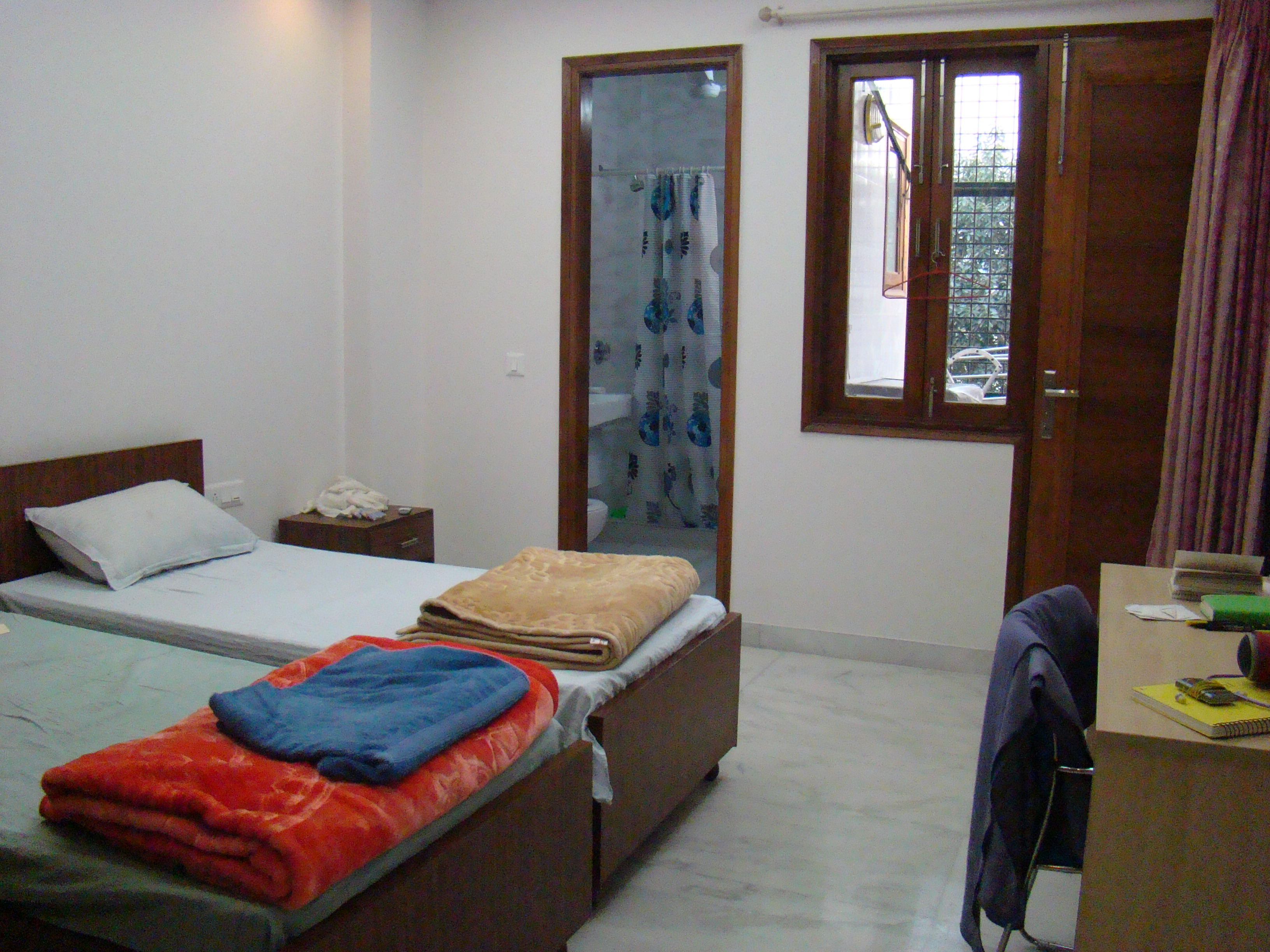 Bedroom at the shared apartment in New Delhi