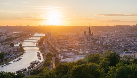 Aerial Panoramic view of Rouen, with the gothic Cathedral of Notre-Dame and Seine River at sunset