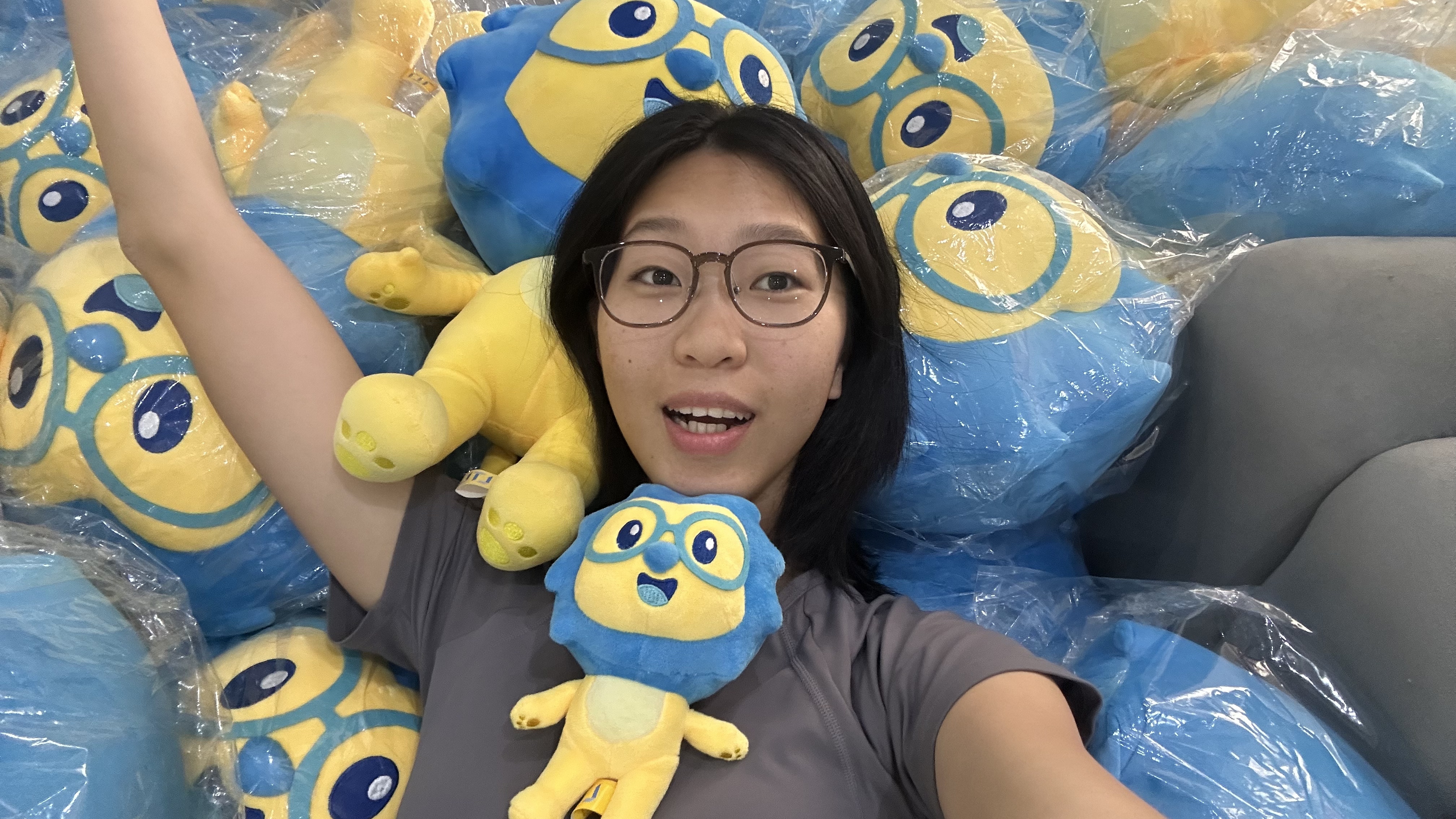 A student with some stuffed toys