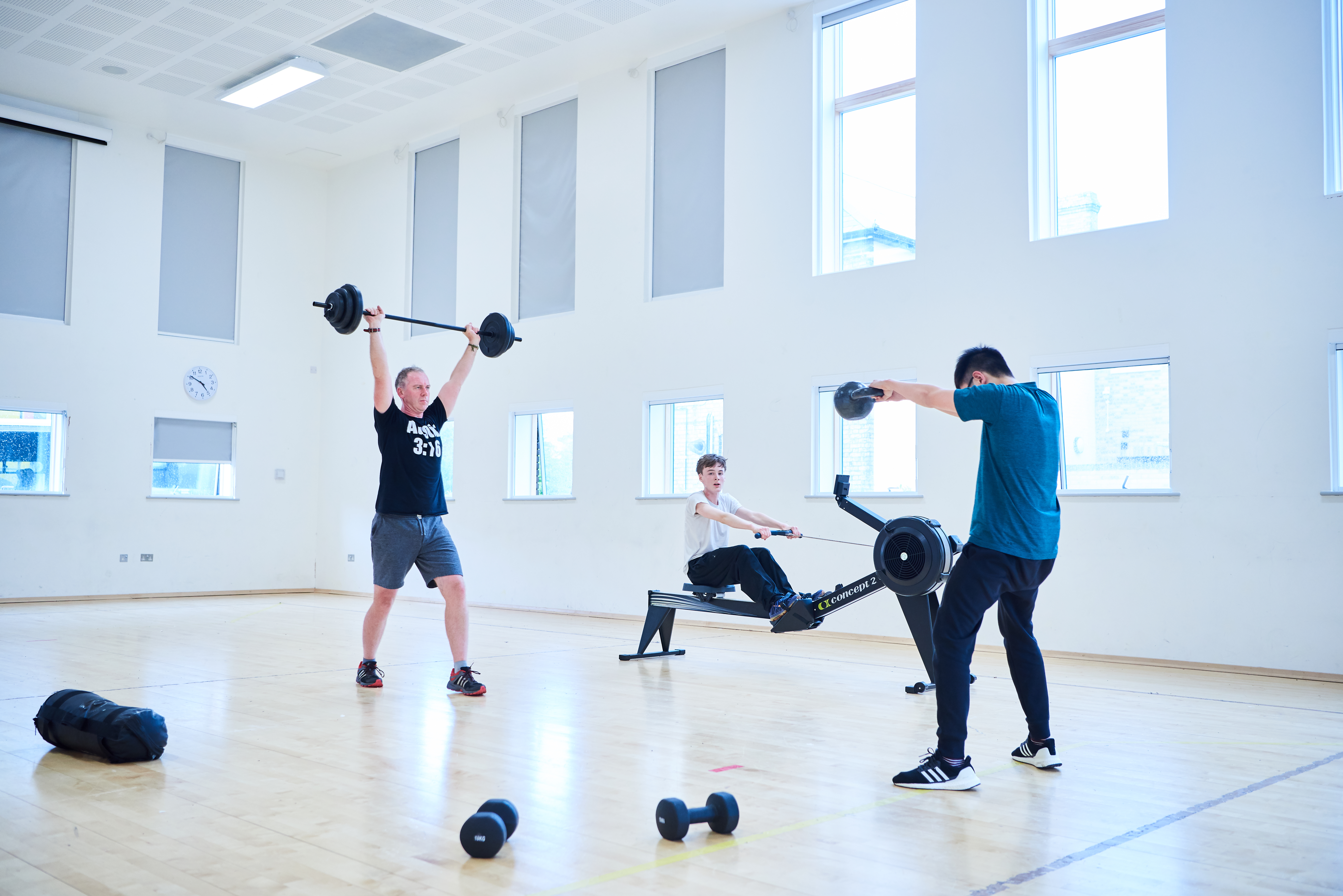 Some students exercising in the sports hall