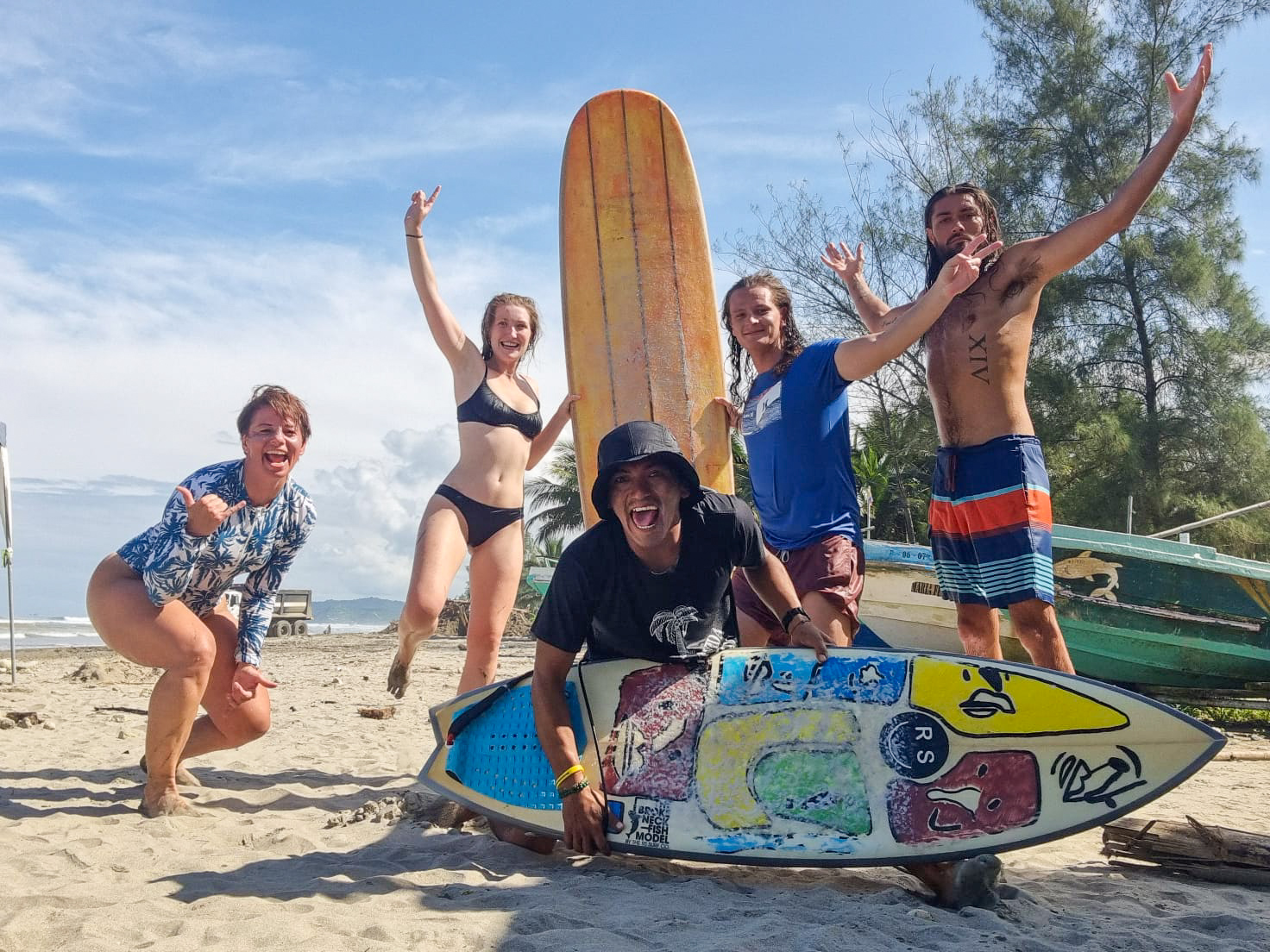 A group of students getting ready to surf