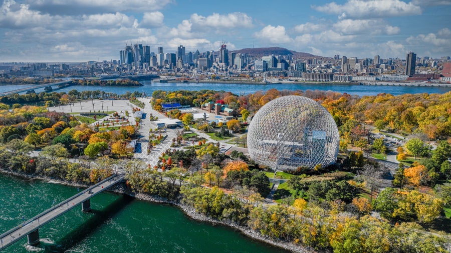 Mount Royal surrounded by lush greenery, while the St. Lawrence River in Montreal, Canada