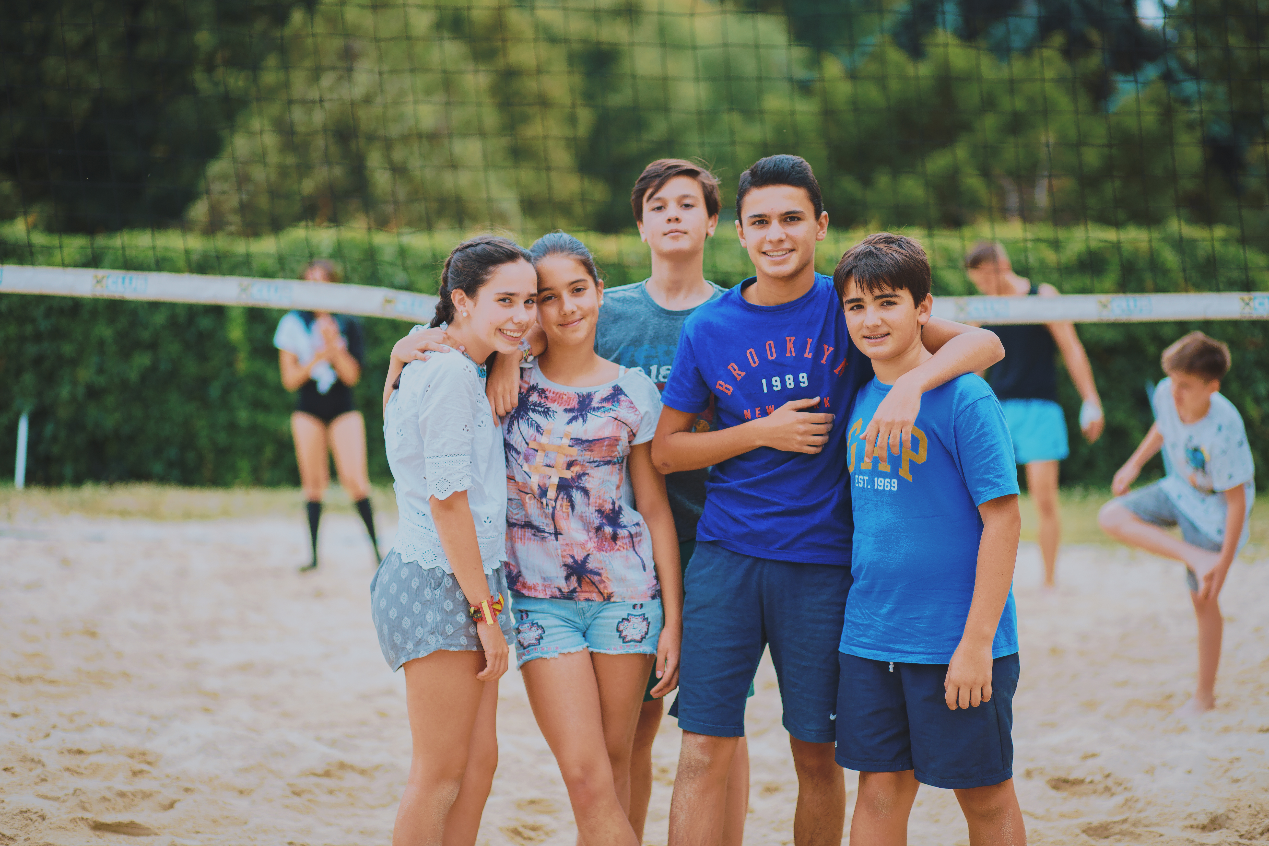 Students in a volleyball field