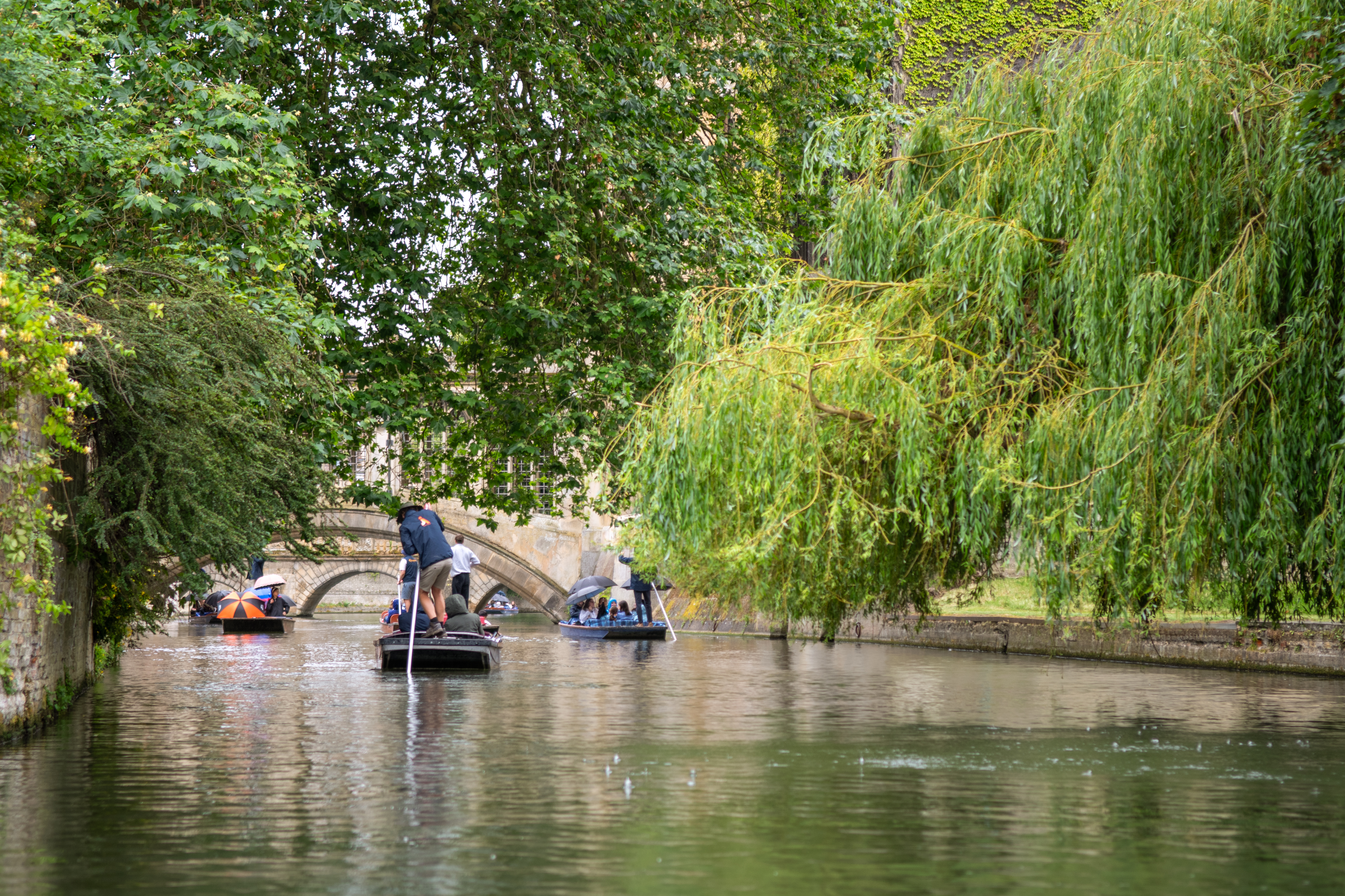 A group of students riding a boat in Cambridge