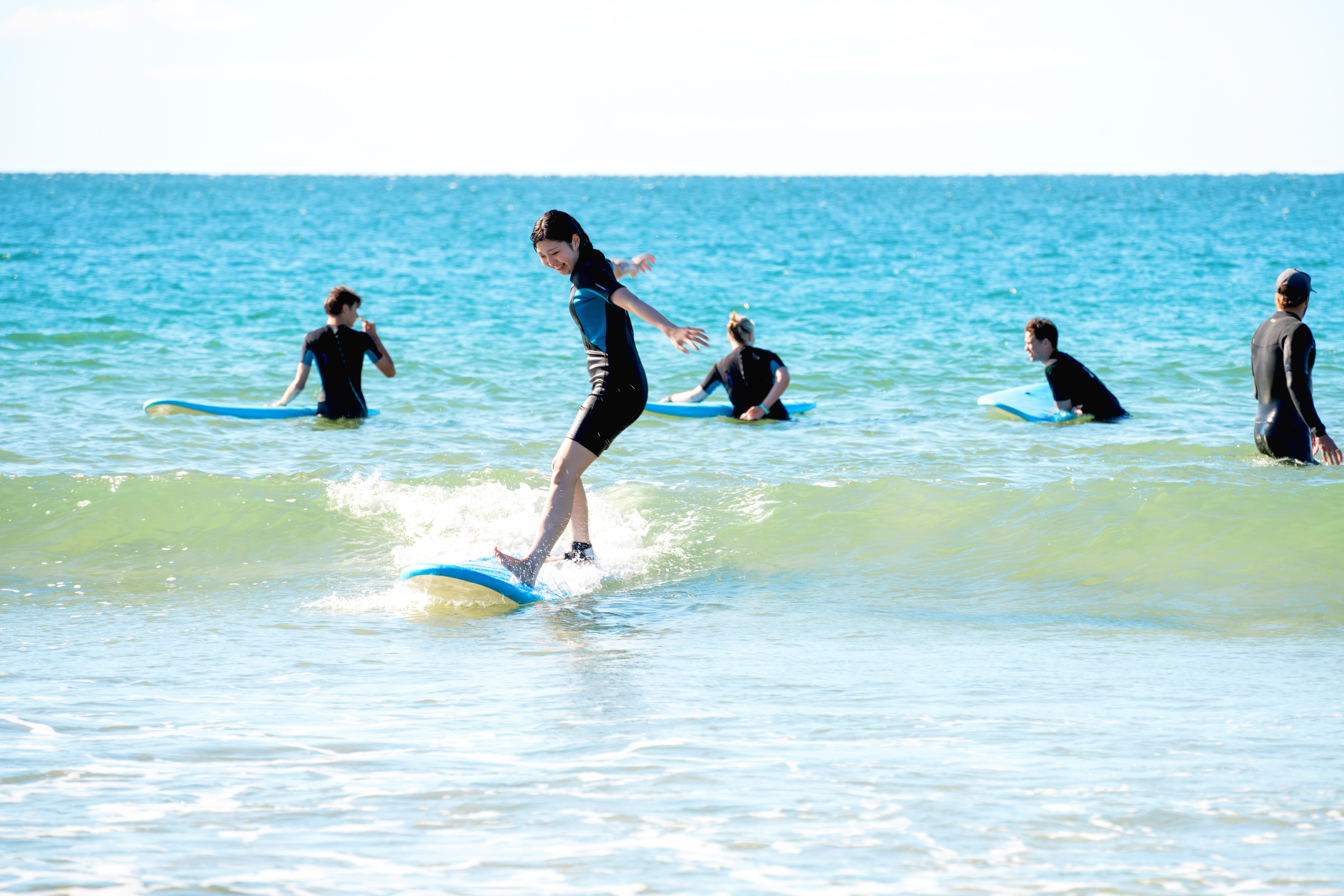 Students surfing in Australia