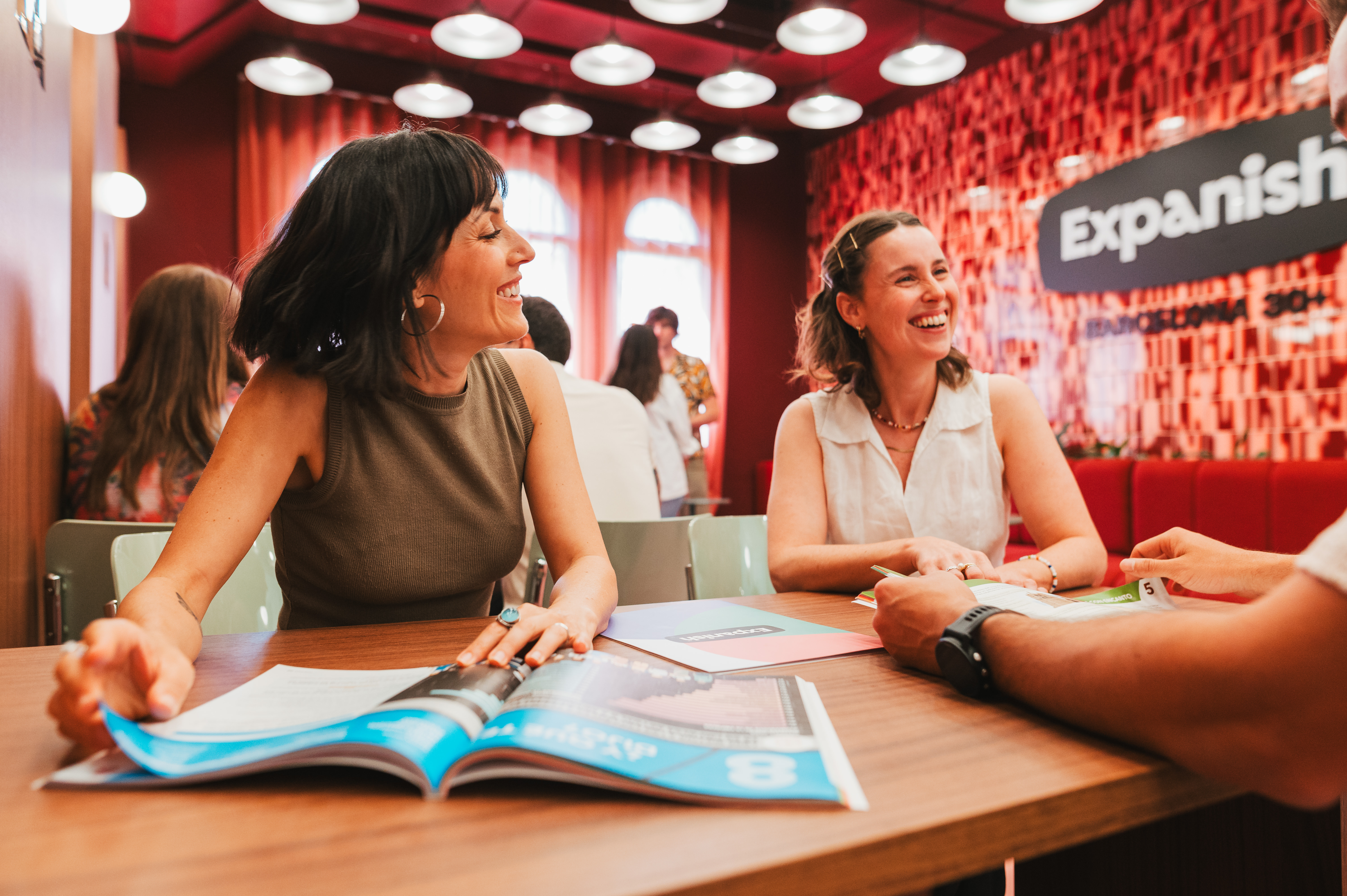 Two students sitting in the common room