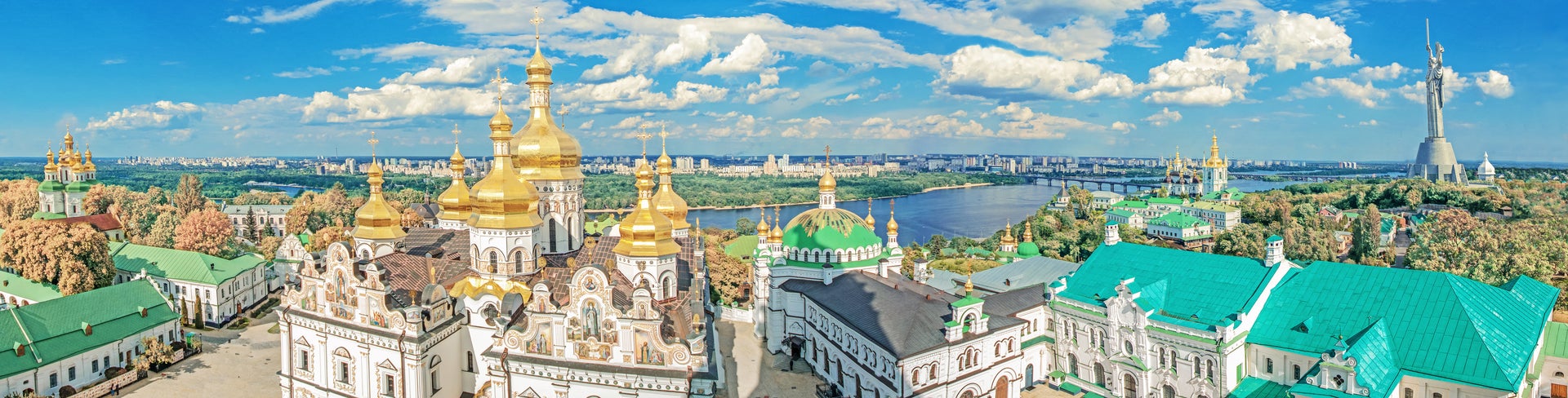 Aerial view of Kiev, Ukraine, featuring Saint Sophia’s Cathedral, other historic buildings, and bustling city life