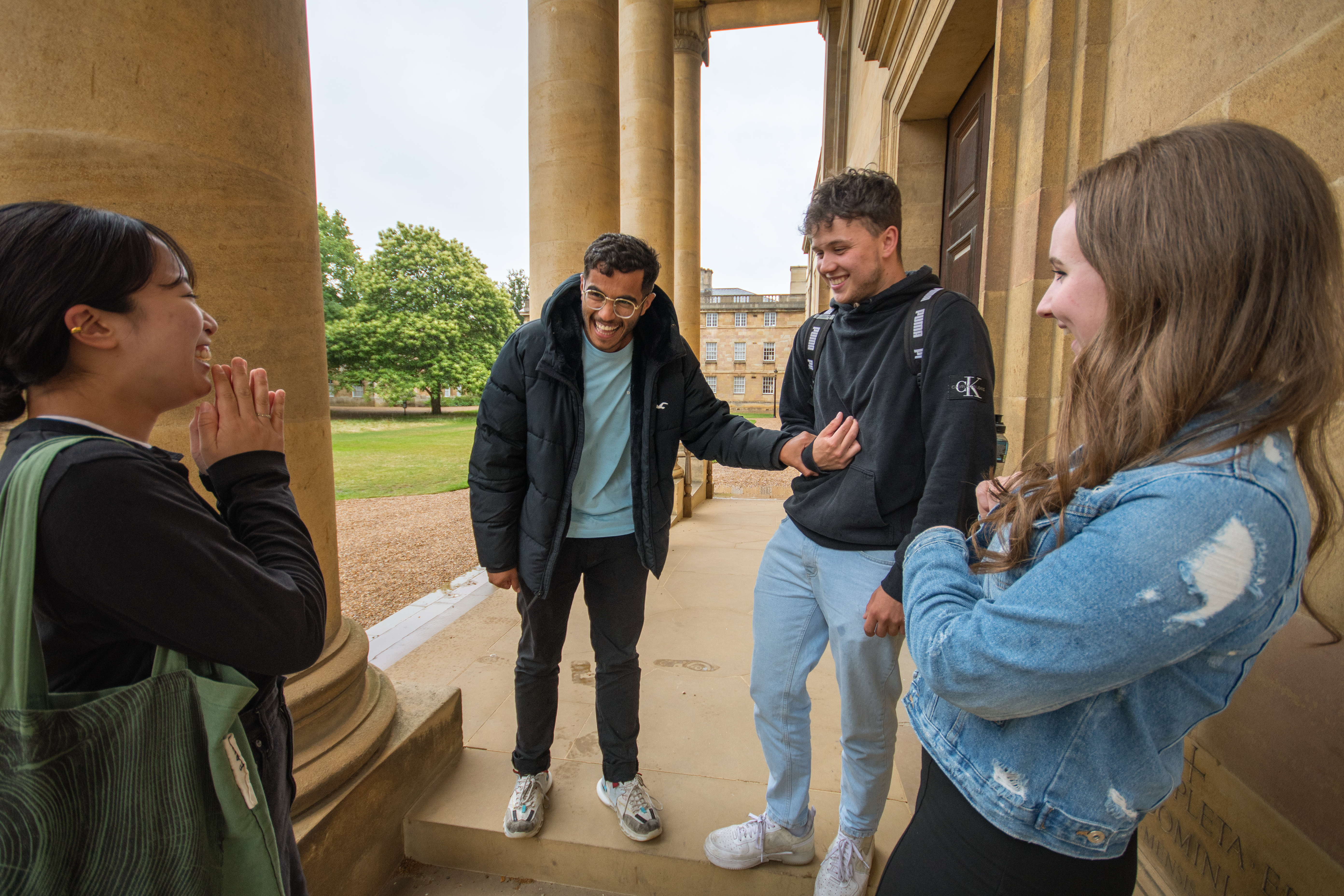 Four students visiting Cambridge