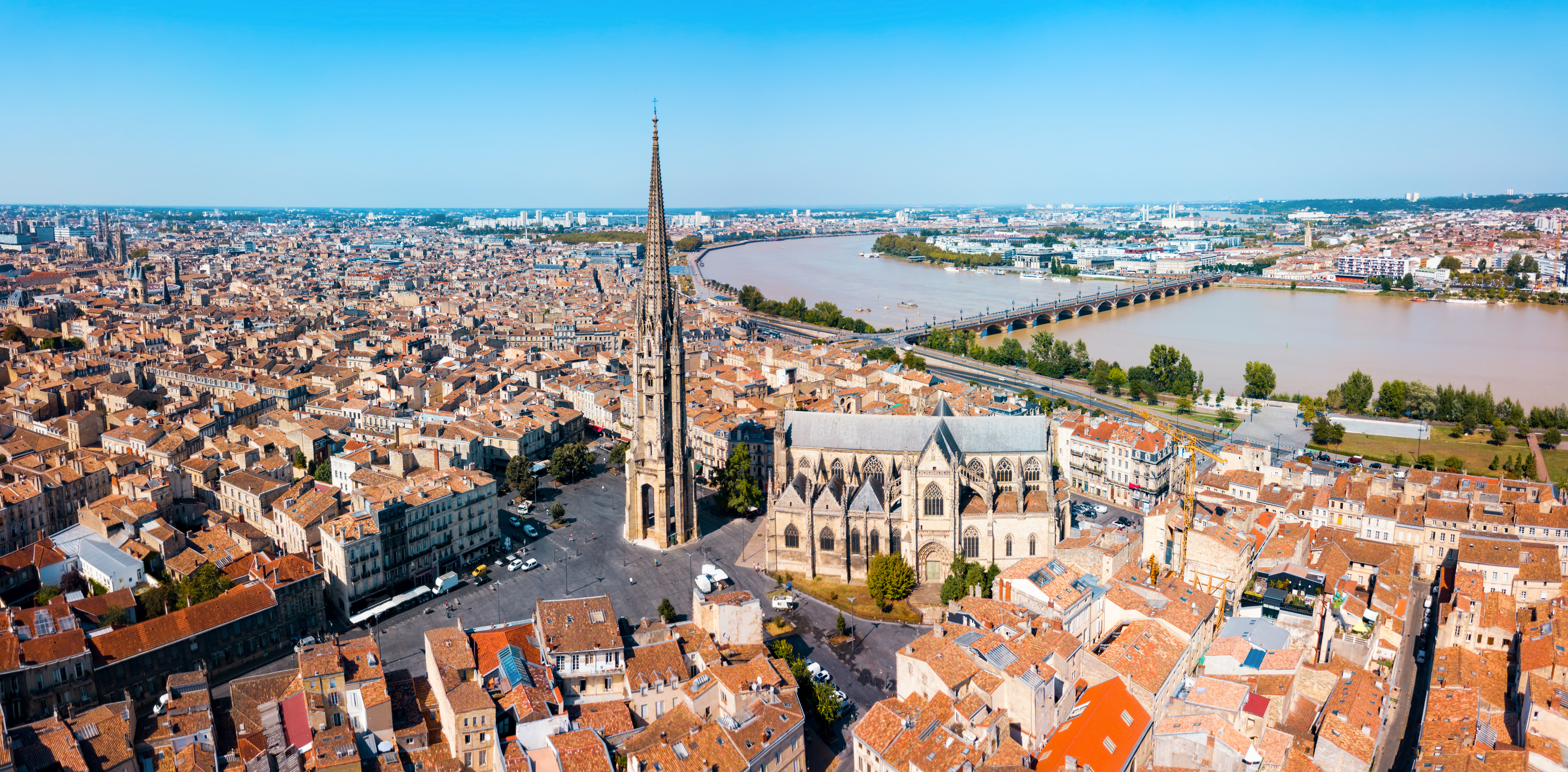 Aerial view of Bordeaux City Center featuring Bordeaux Cathedral, officially known as Cathédrale Saint-André de Bordeaux and Garonne River, France