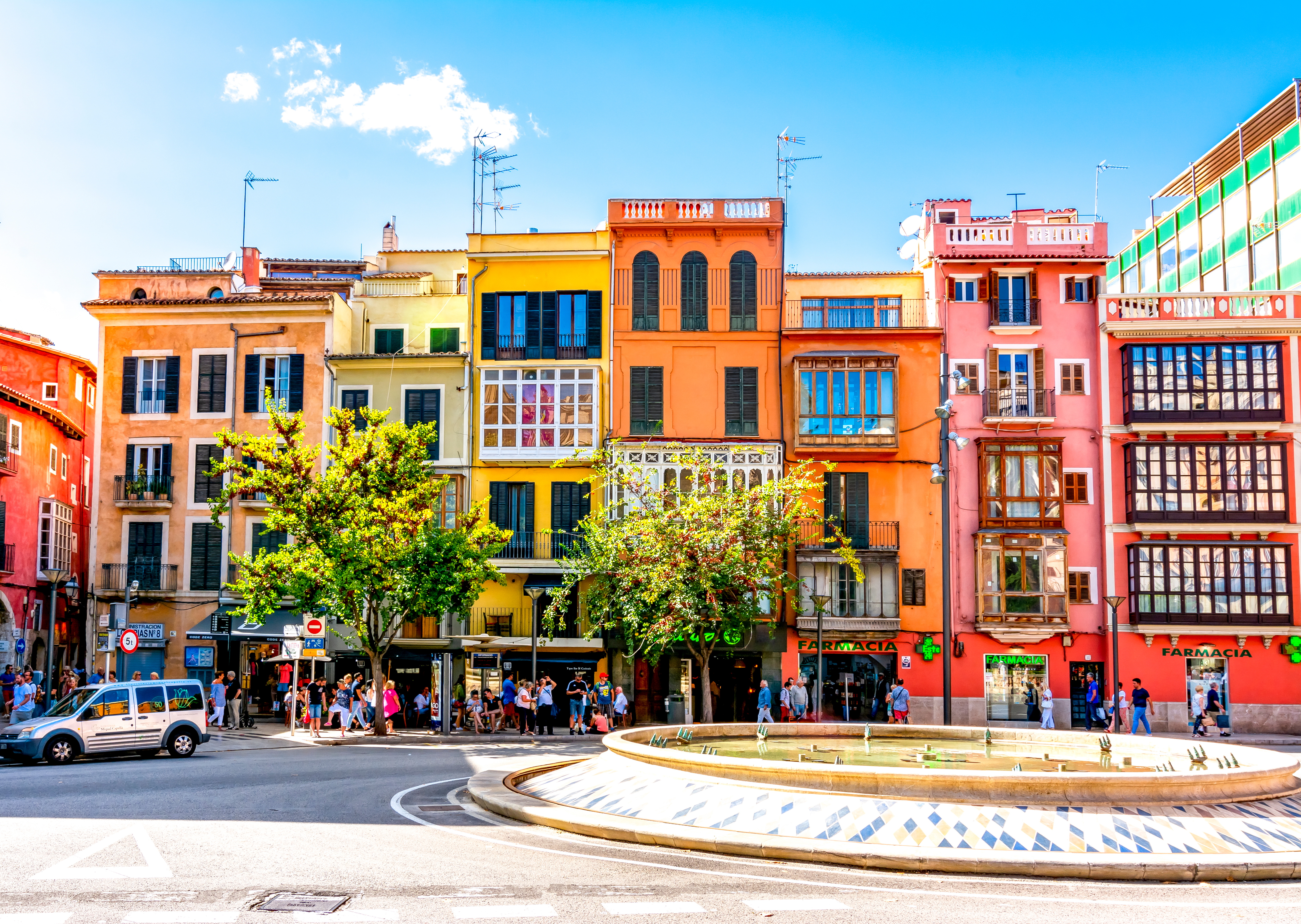 City center of Palma de Mallorca, Spain, featuring colorful buildings with traditional shutters and balconies