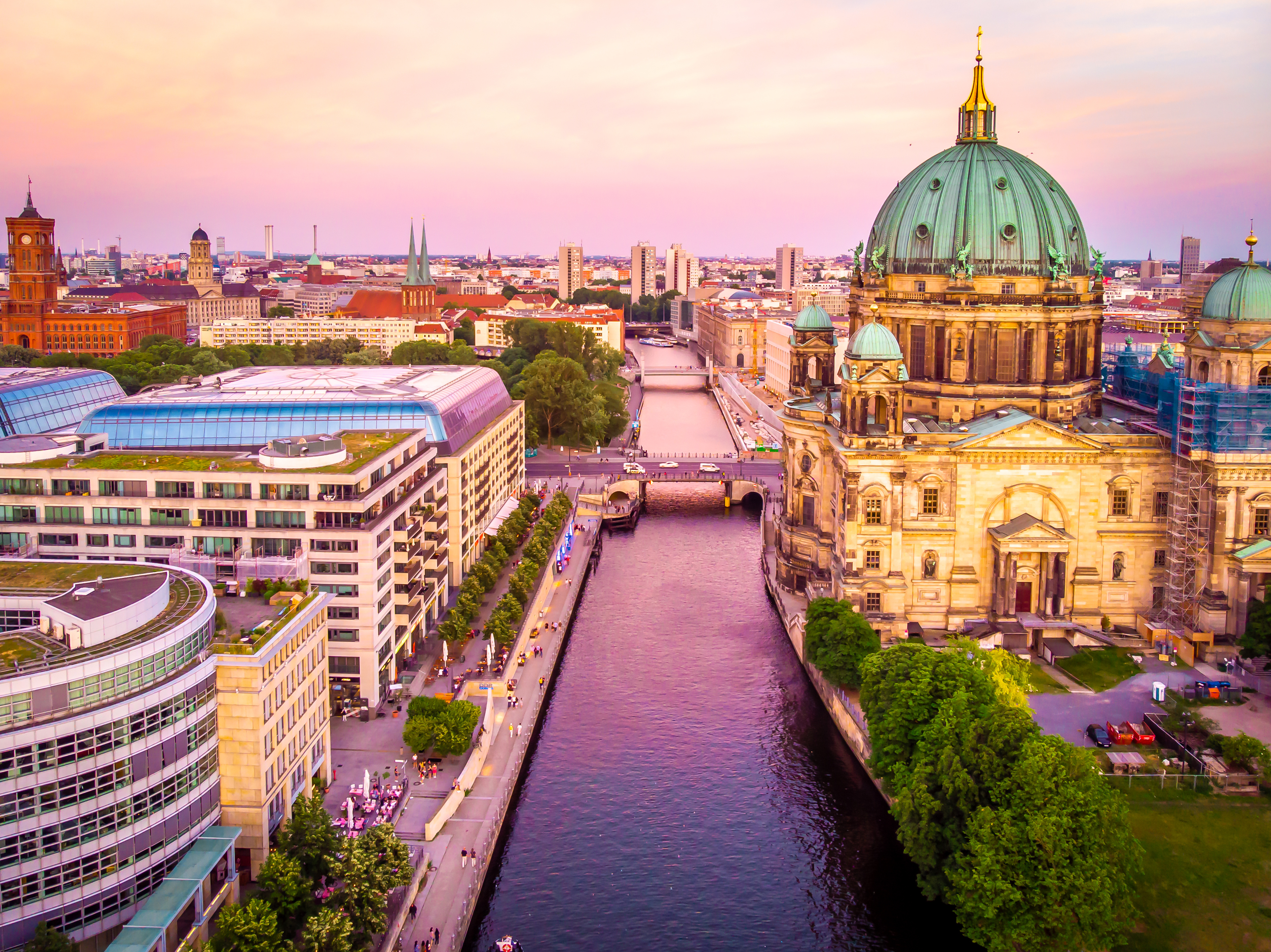 Berlin Cathedral (Berliner Dom) surrounded by lush gardens and situated near the Spree River in Germany