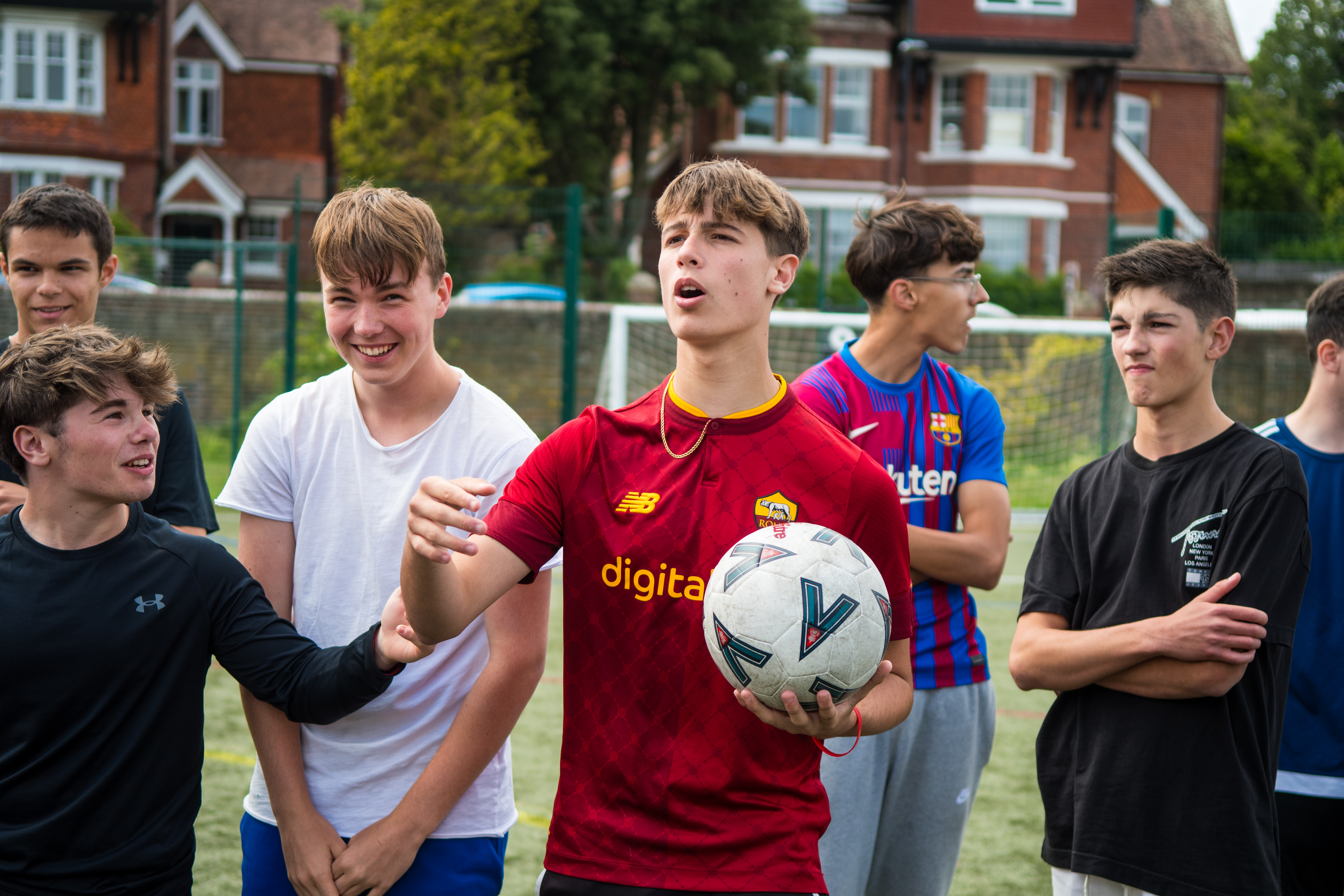 A group of students playing football