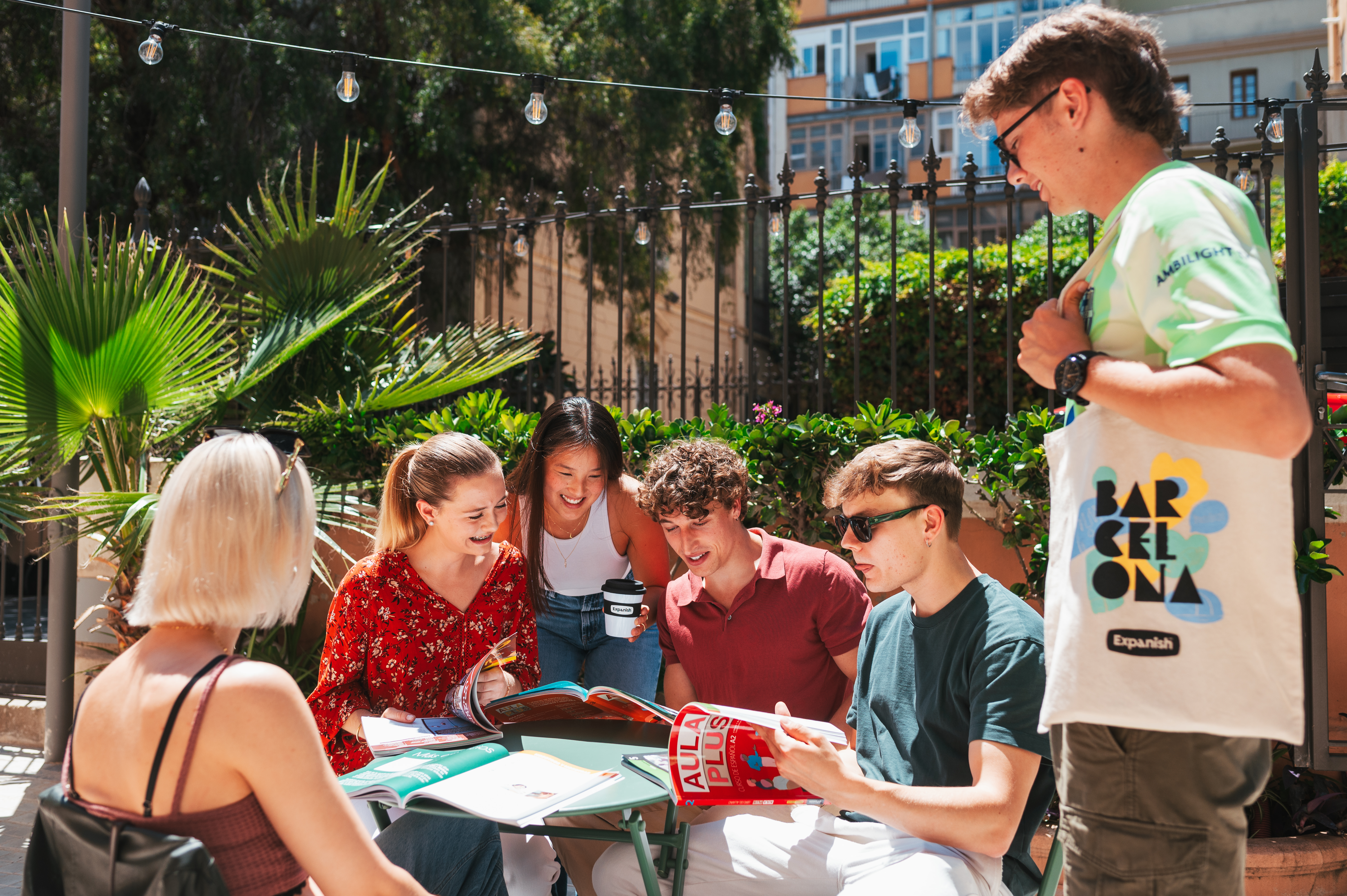 A group of students sitting in the school's garden