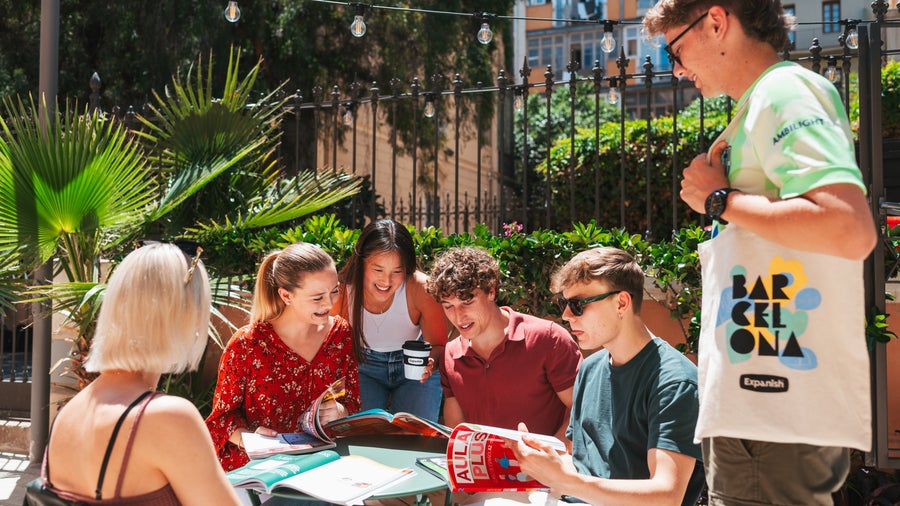 A group of students sitting in the school's garden