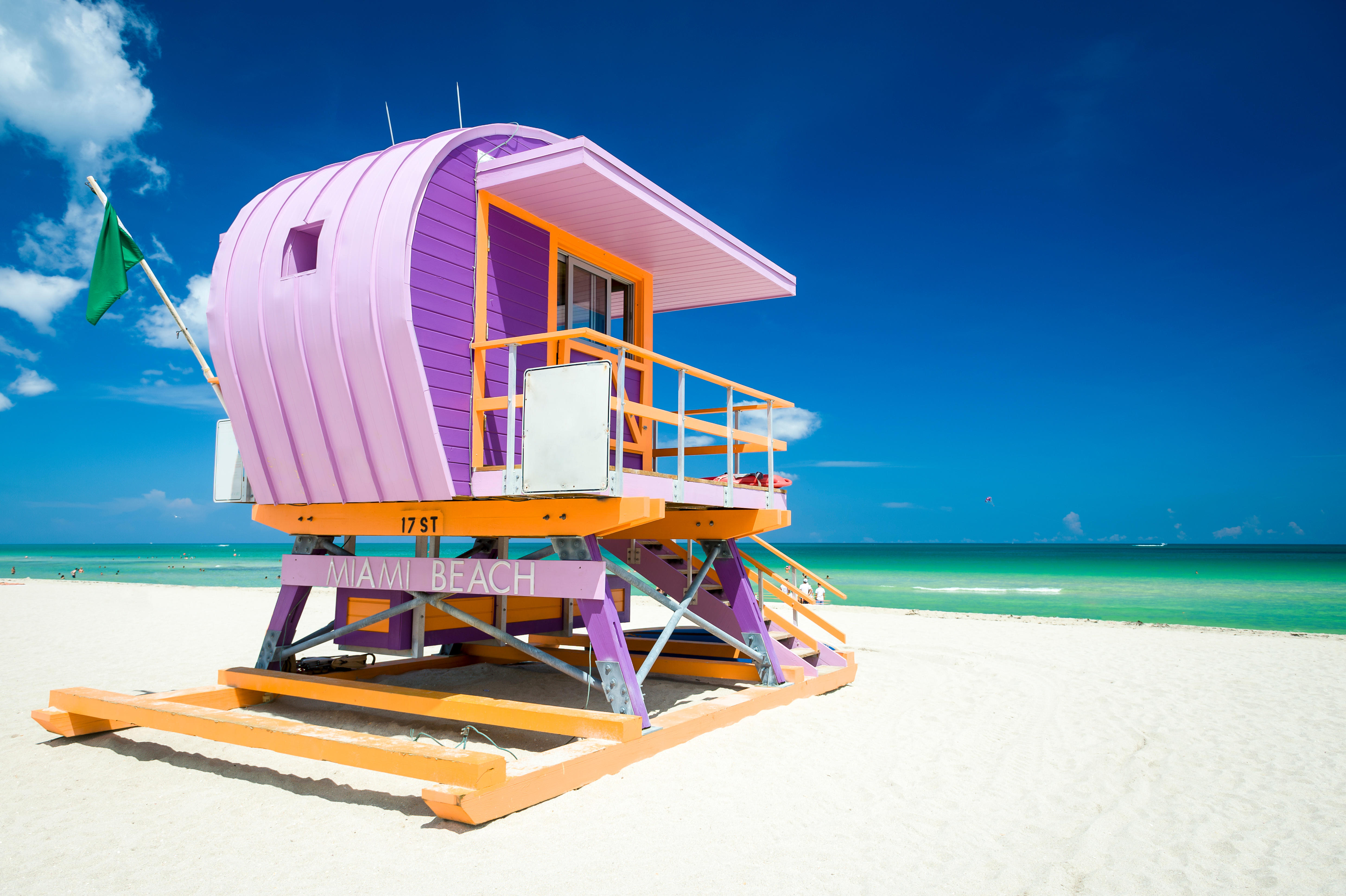 Colourful lifeguard tower on sunny South Beach, Miami Florida, with bright blue sky overhead